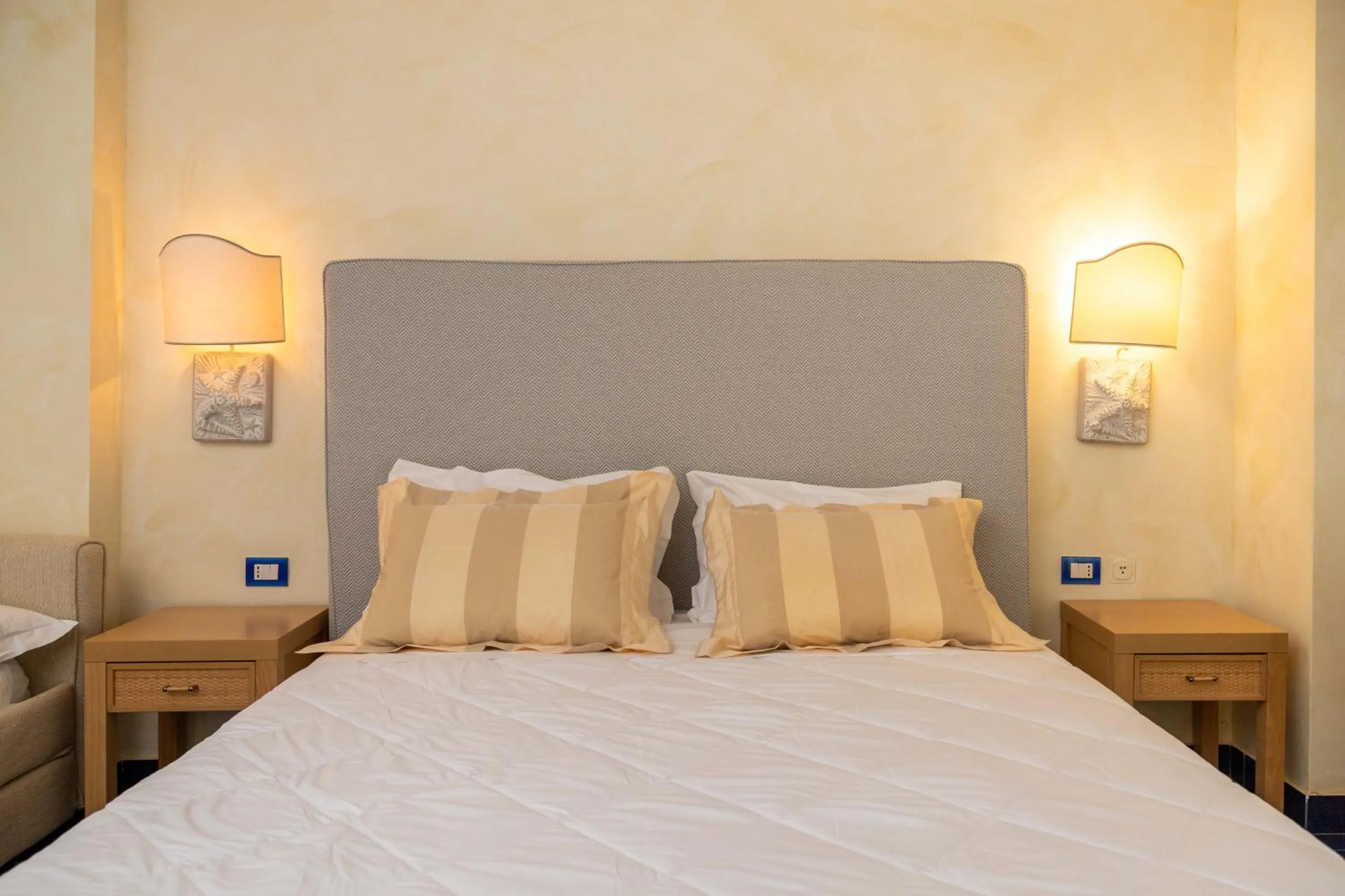 Bed in AH Premium Baia dei Faraglioni