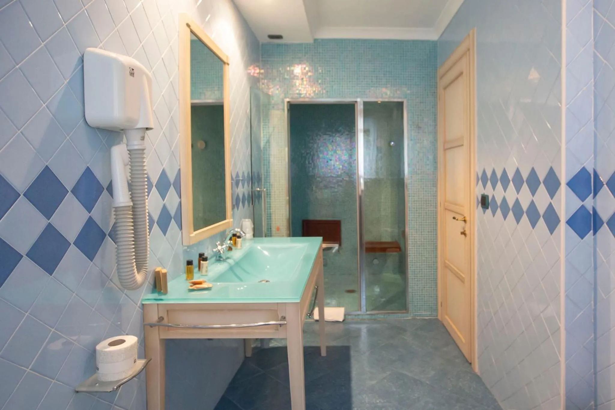 Bathroom in AH Premium Baia dei Faraglioni