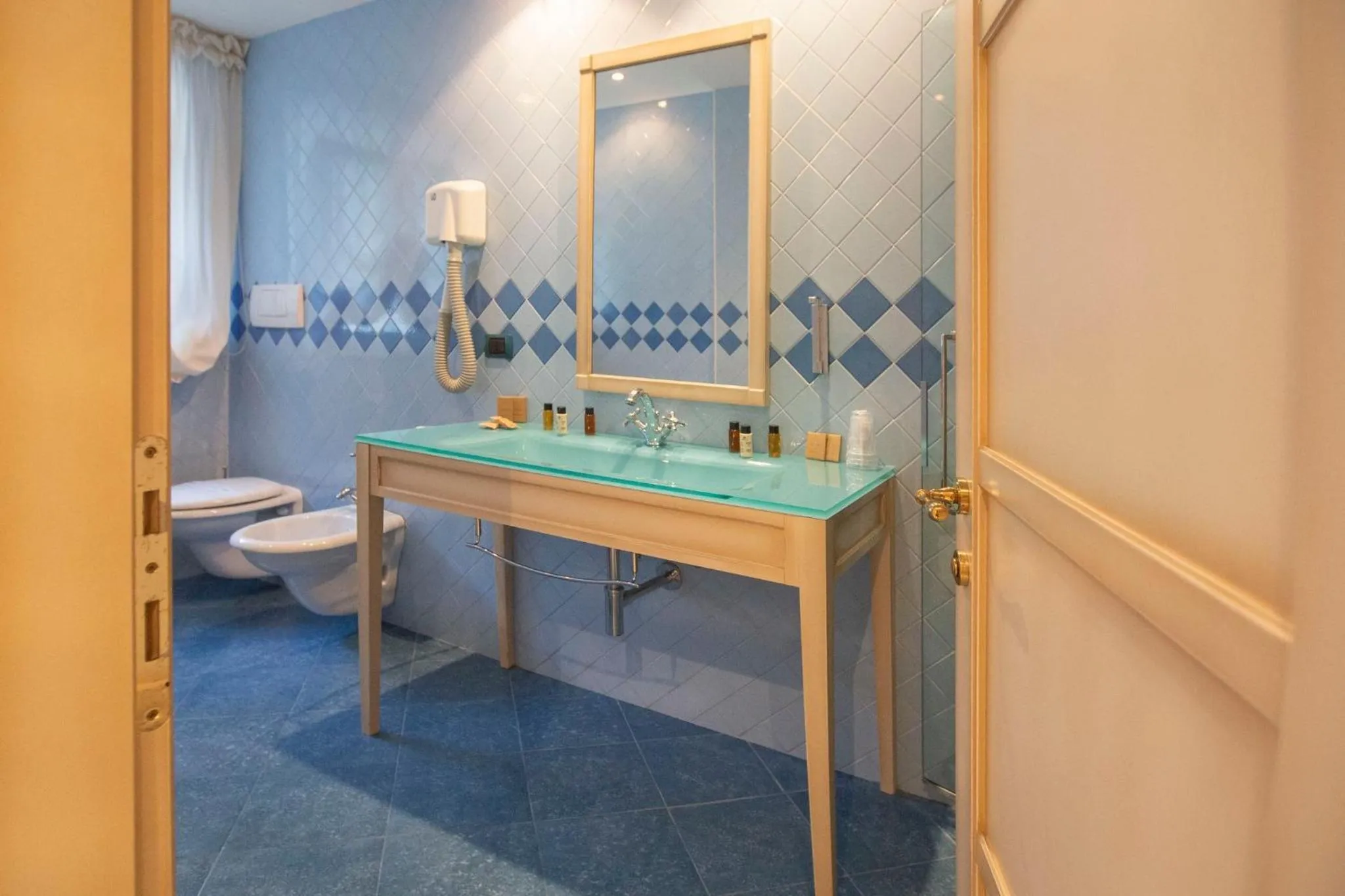 Bathroom in AH Premium Baia dei Faraglioni