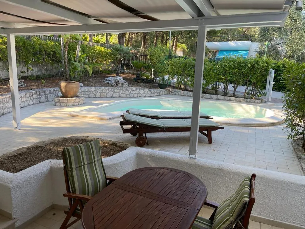 Swimming pool in AH Premium Baia dei Faraglioni