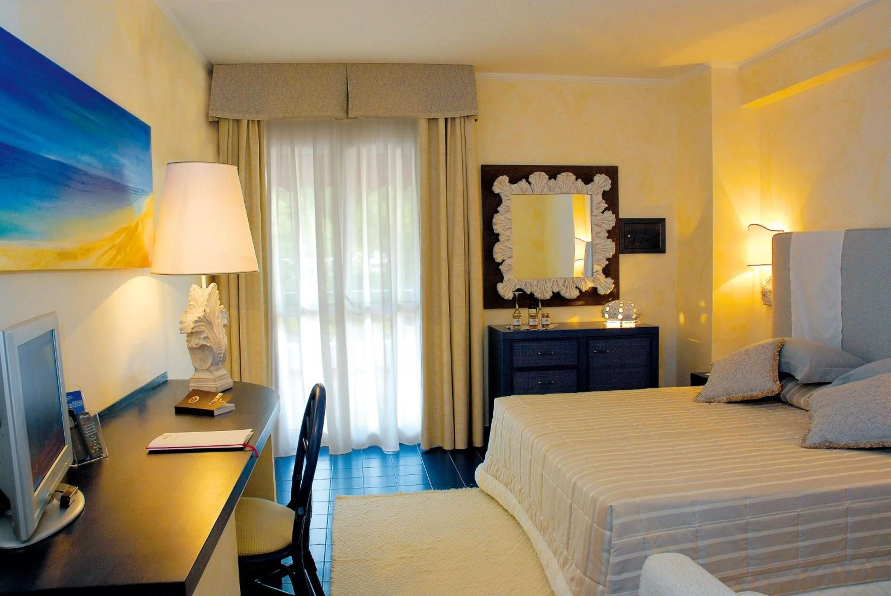 Bed in AH Premium Baia dei Faraglioni