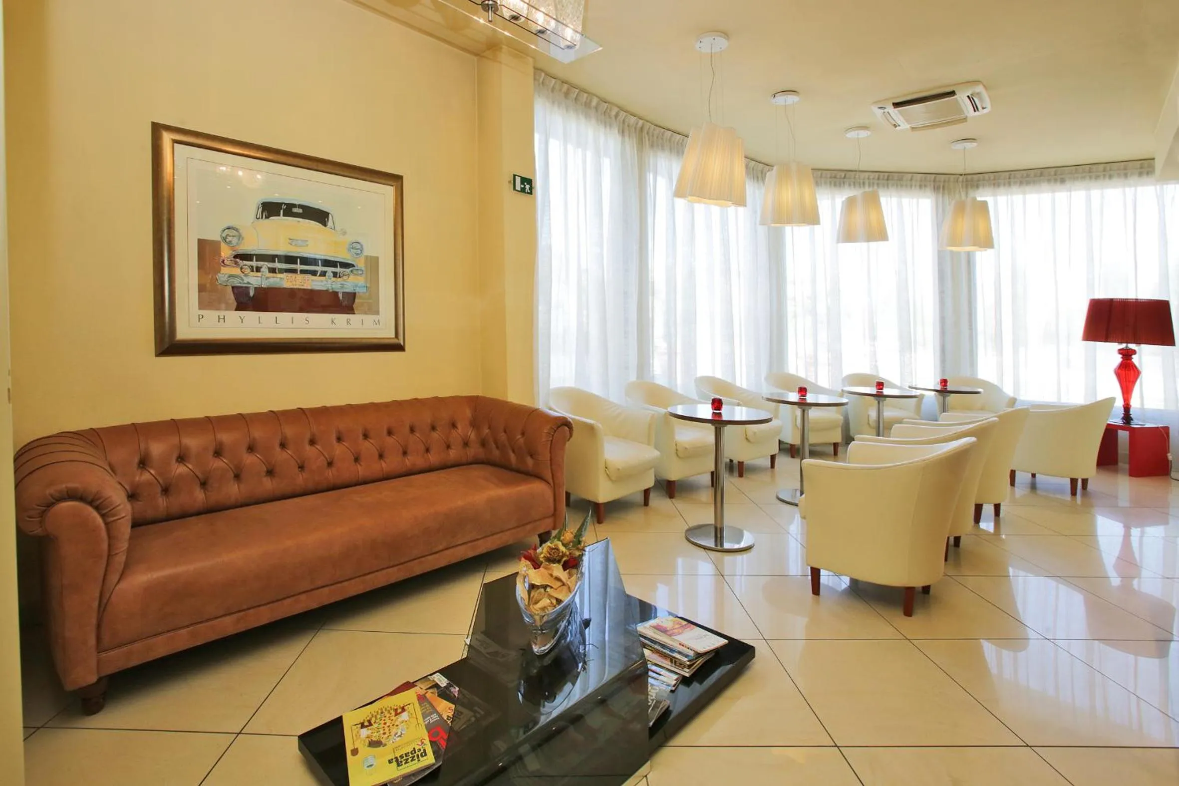 Communal lounge/ TV room in Hotel Touring