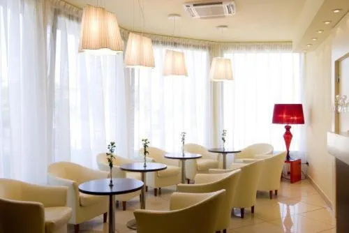 Communal lounge/ TV room in Hotel Touring