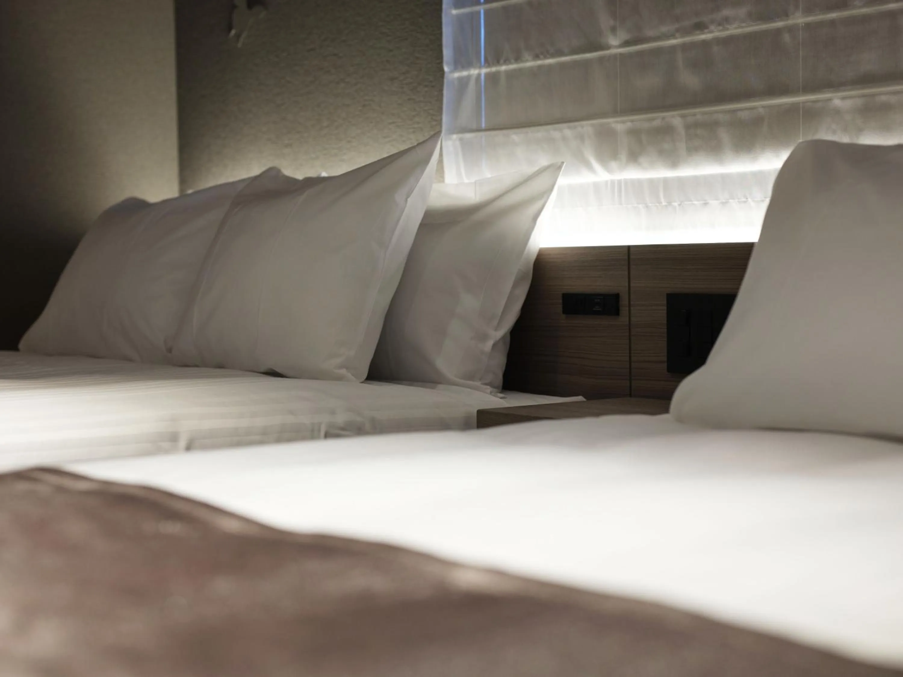 Bed in MONday Apart Premium Kyoto Sta Kamogawa