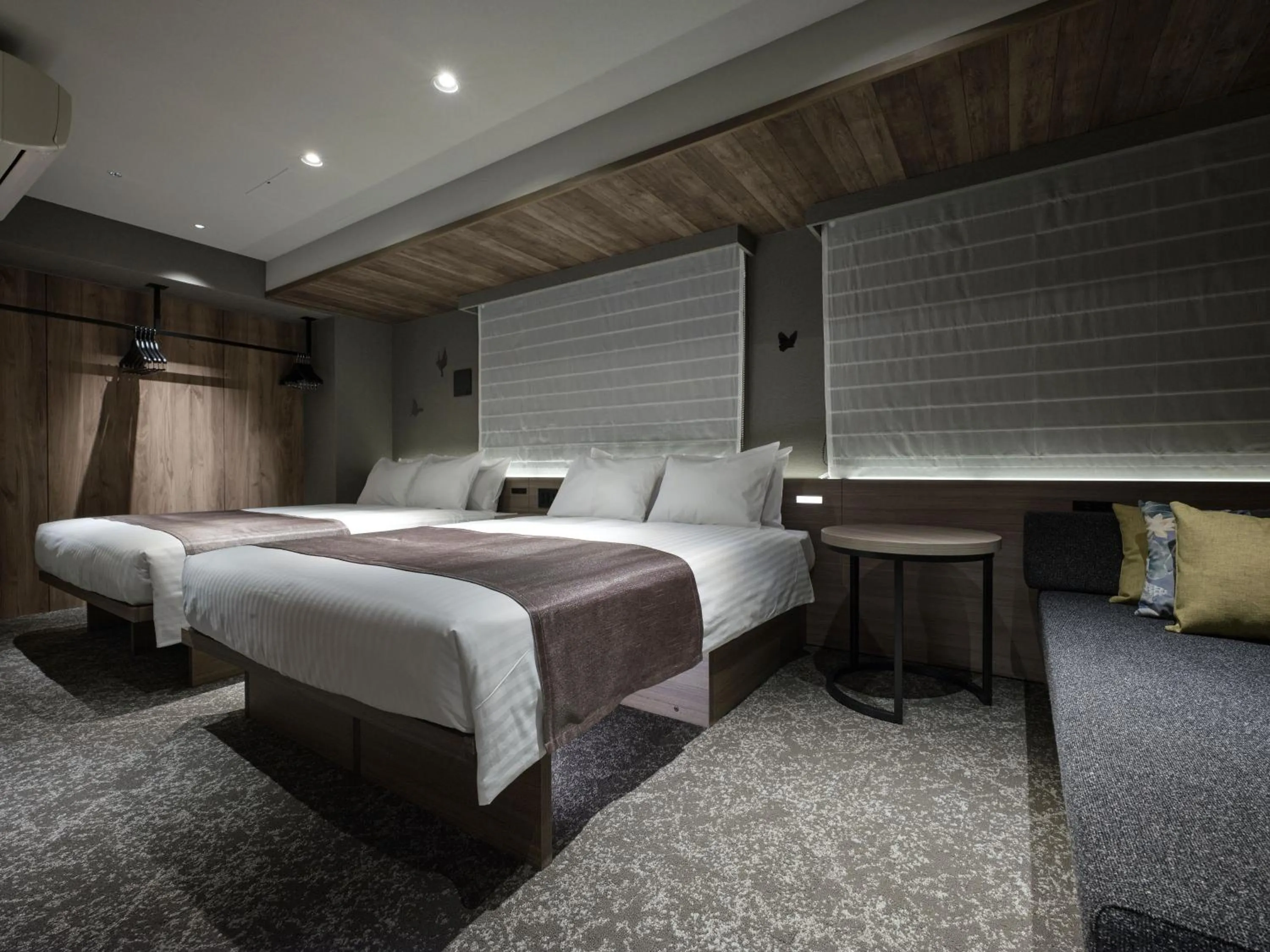 Bed in MONday Apart Premium Kyoto Sta Kamogawa