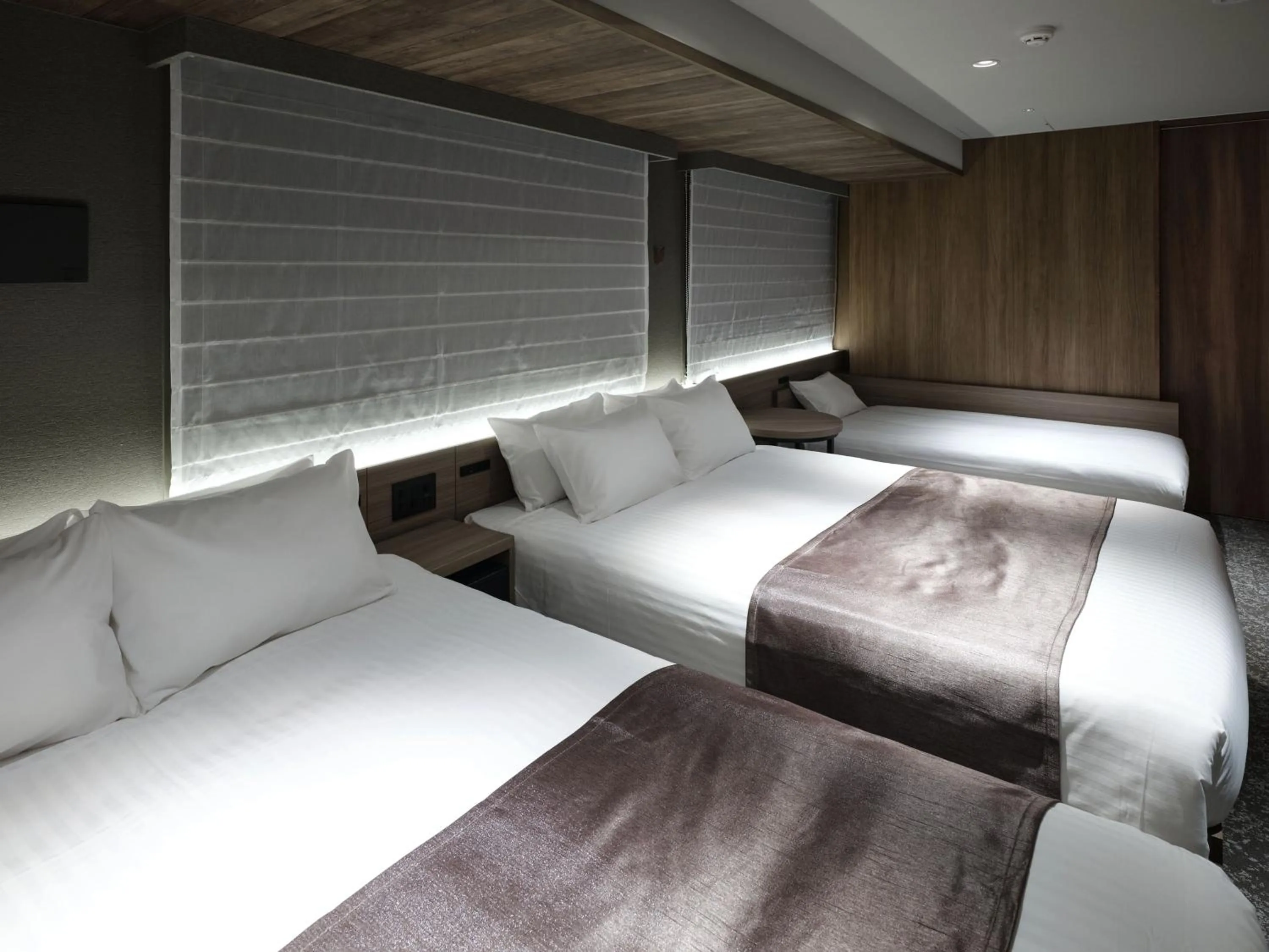 Bed in MONday Apart Premium Kyoto Sta Kamogawa