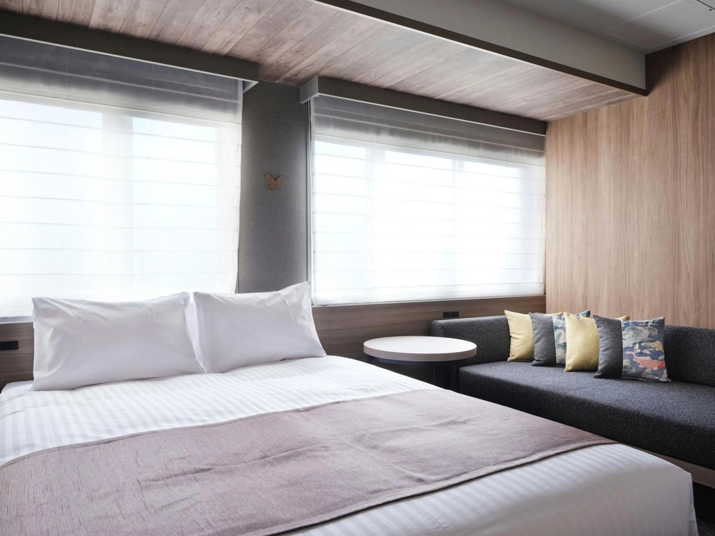 Bed in MONday Apart Premium Kyoto Sta Kamogawa