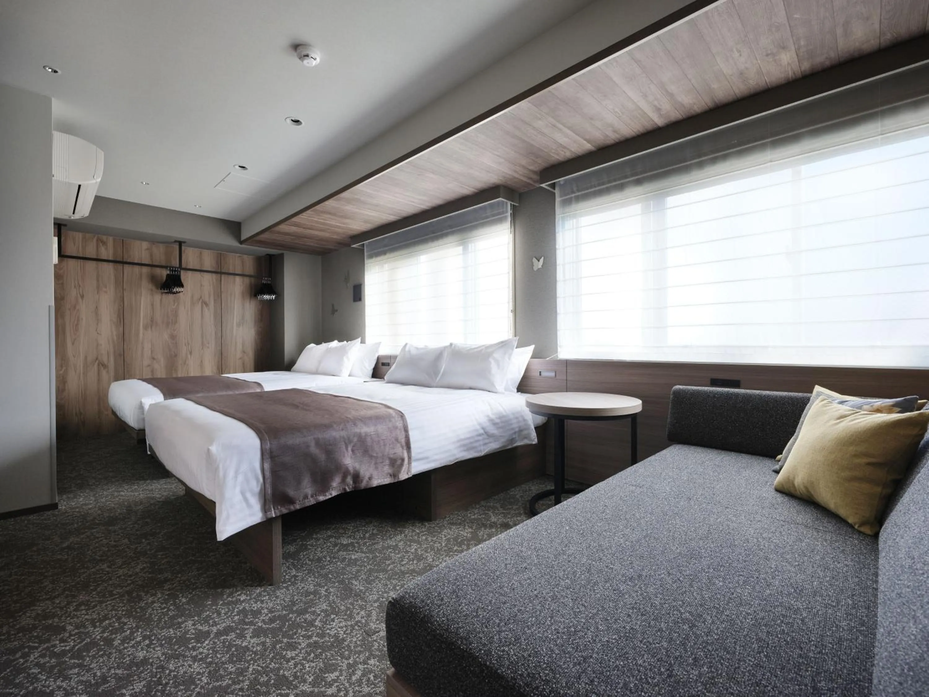 Bed in MONday Apart Premium Kyoto Sta Kamogawa