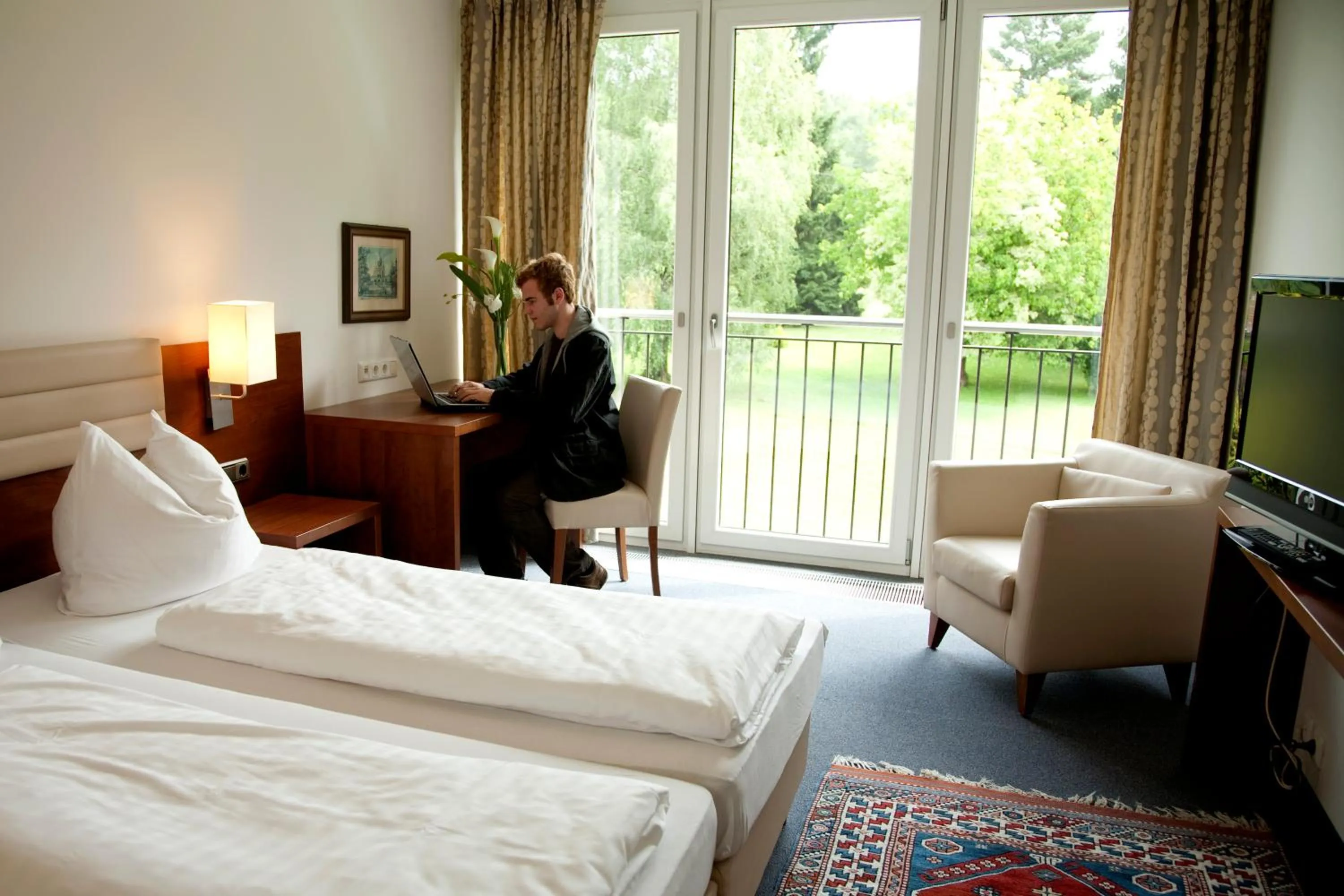 Bed in Hotel Alhartinger Hof