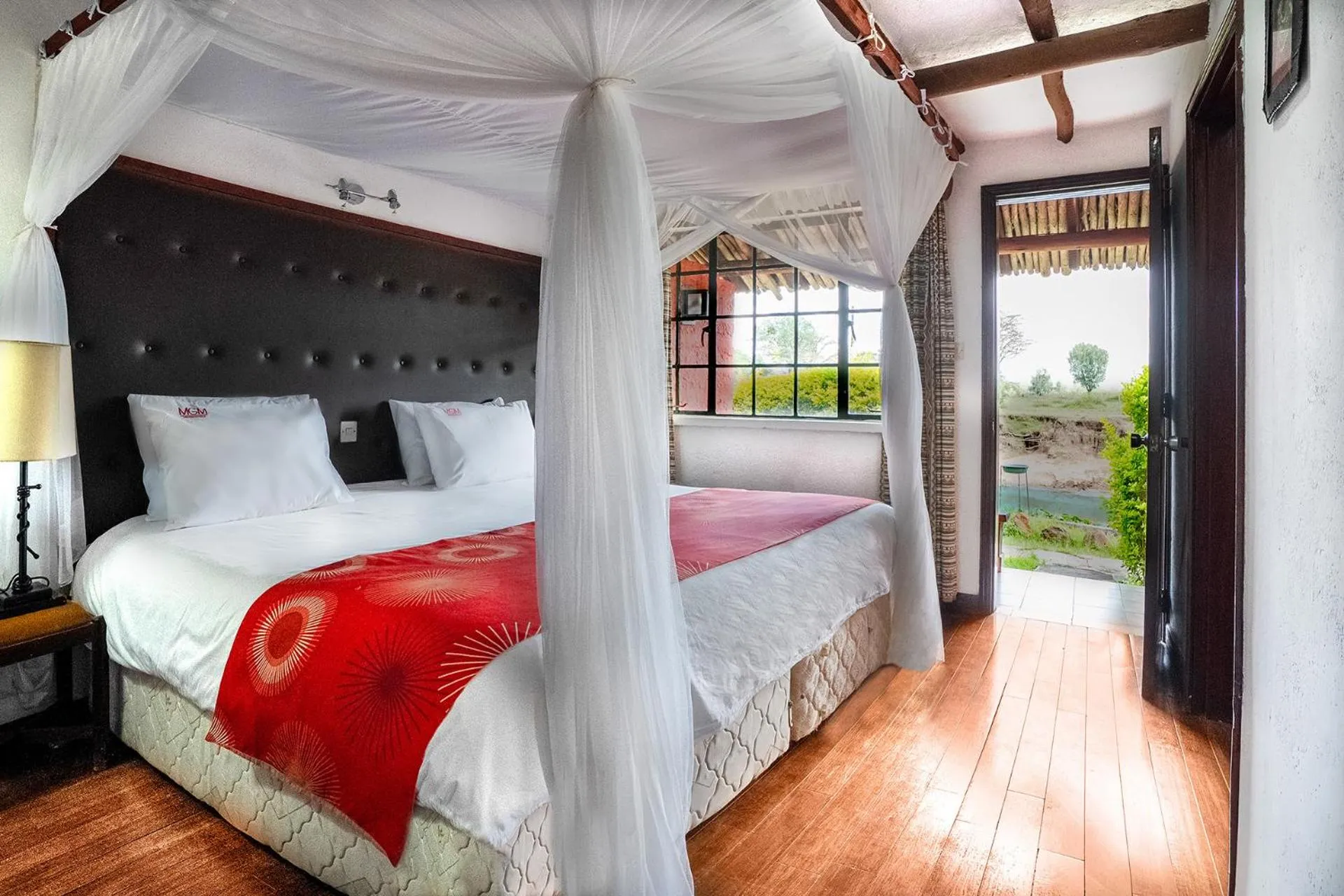 Bed in Muthu Mara River Lodge