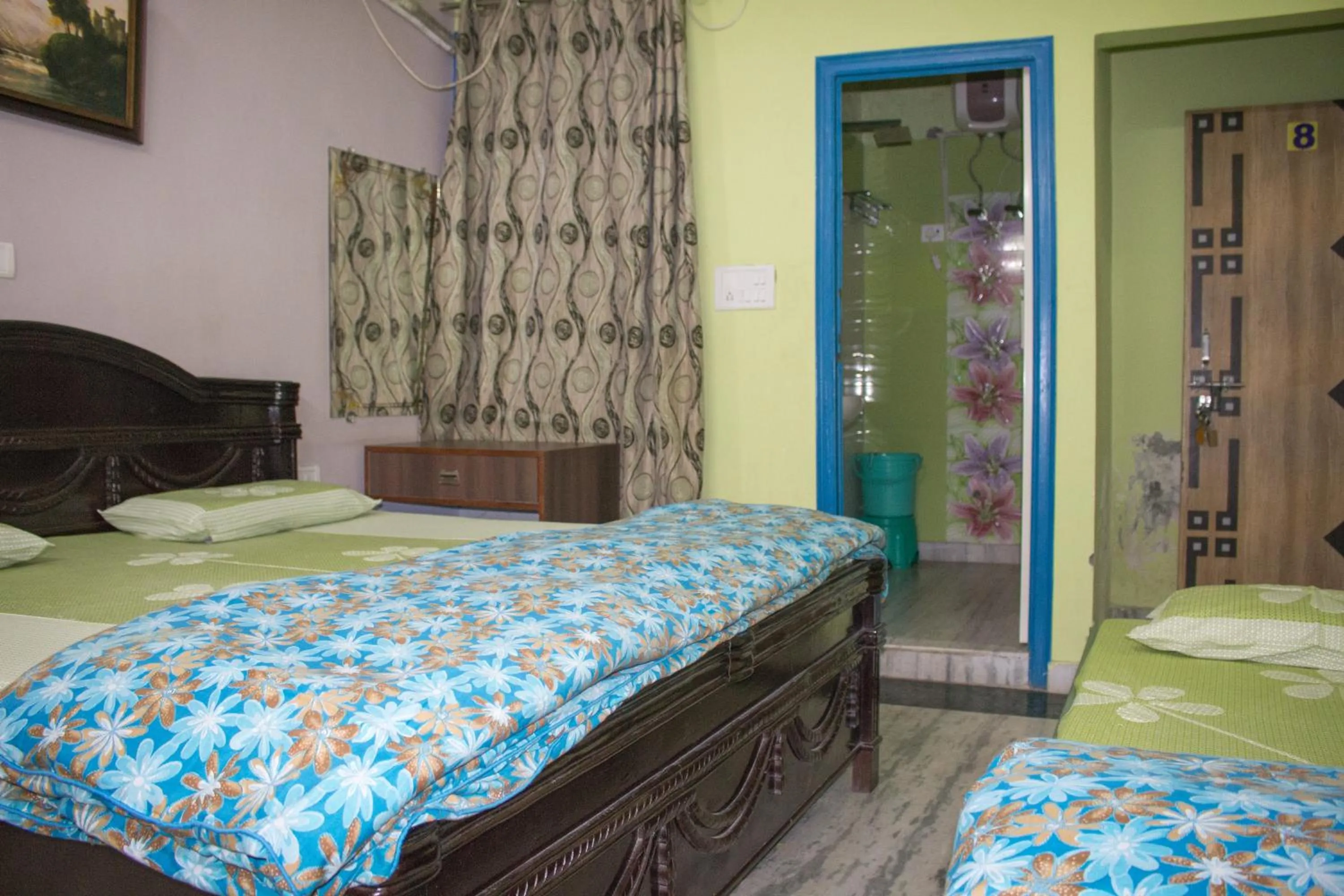 Photo of the whole room in Hotel Golden Crown Laxman Jhula