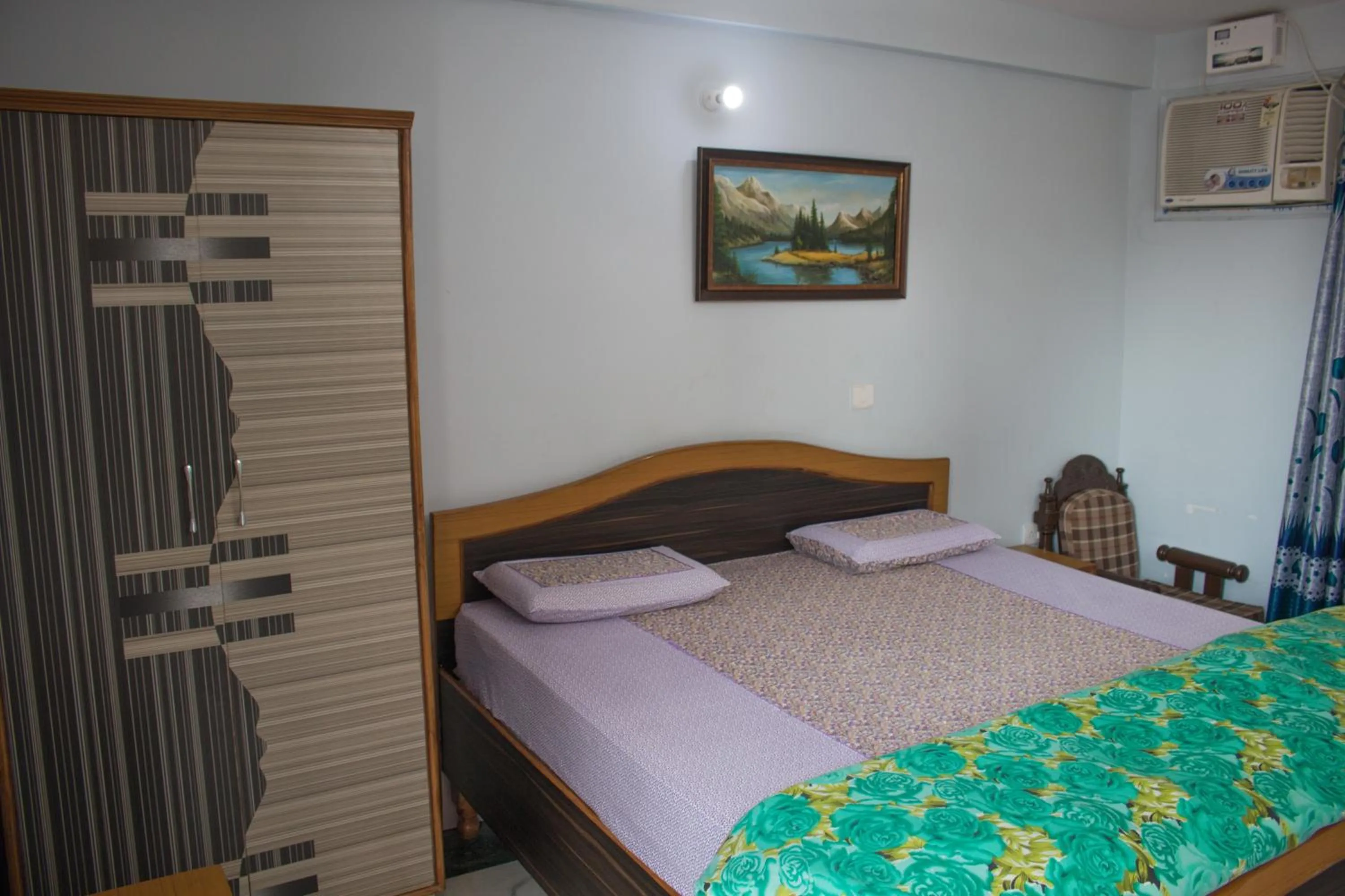 Photo of the whole room in Hotel Golden Crown Laxman Jhula