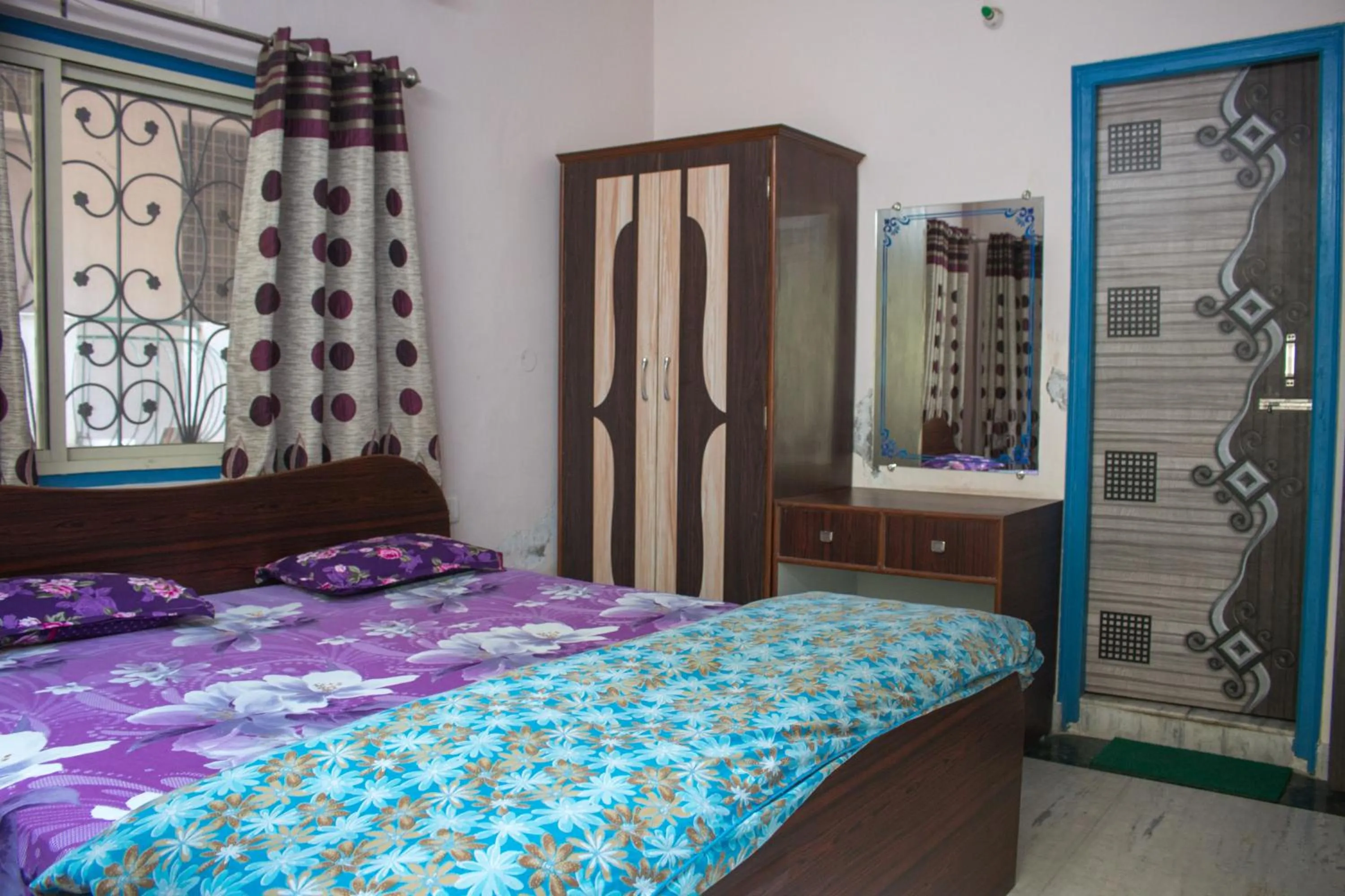 Photo of the whole room in Hotel Golden Crown Laxman Jhula