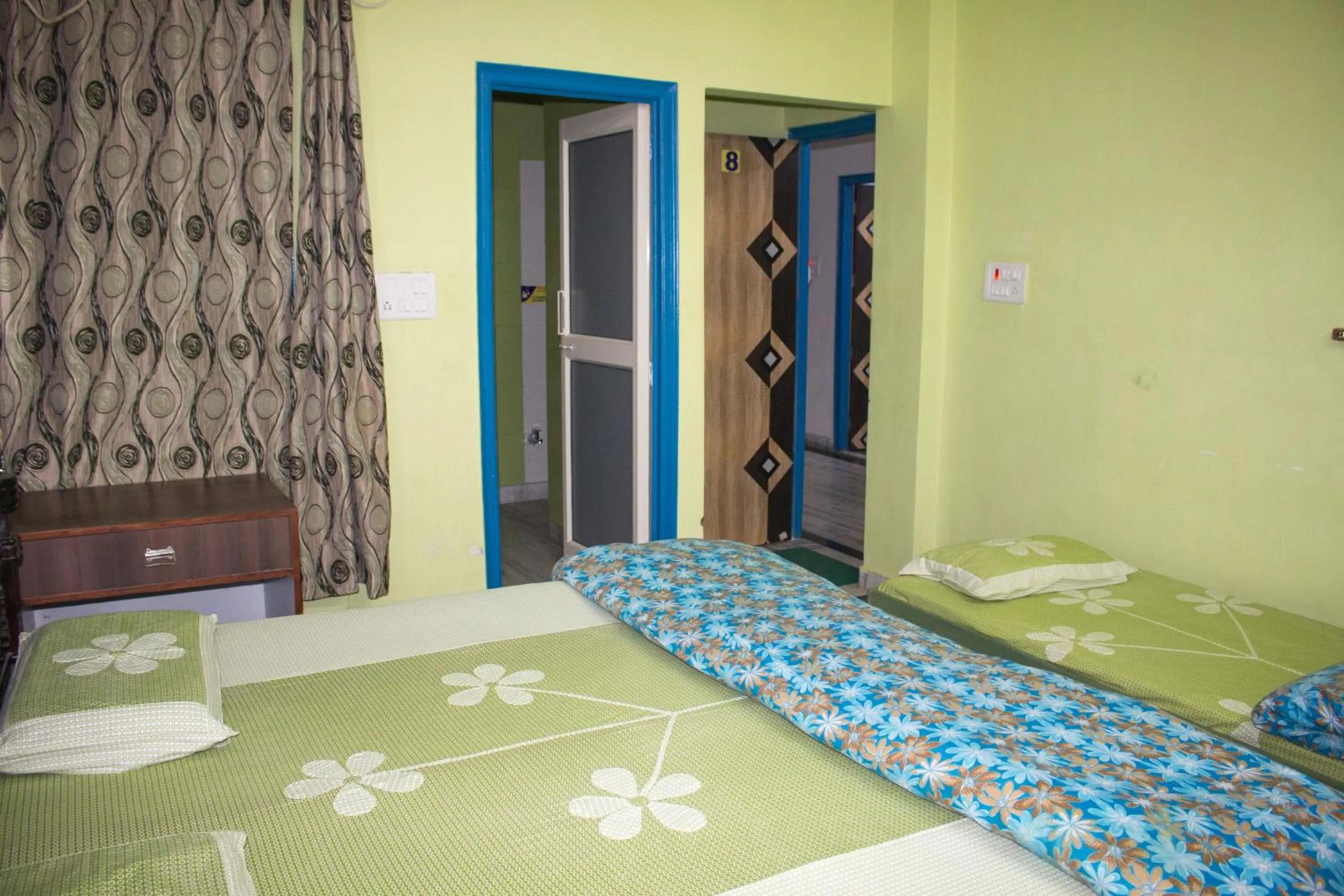 Photo of the whole room in Hotel Golden Crown Laxman Jhula