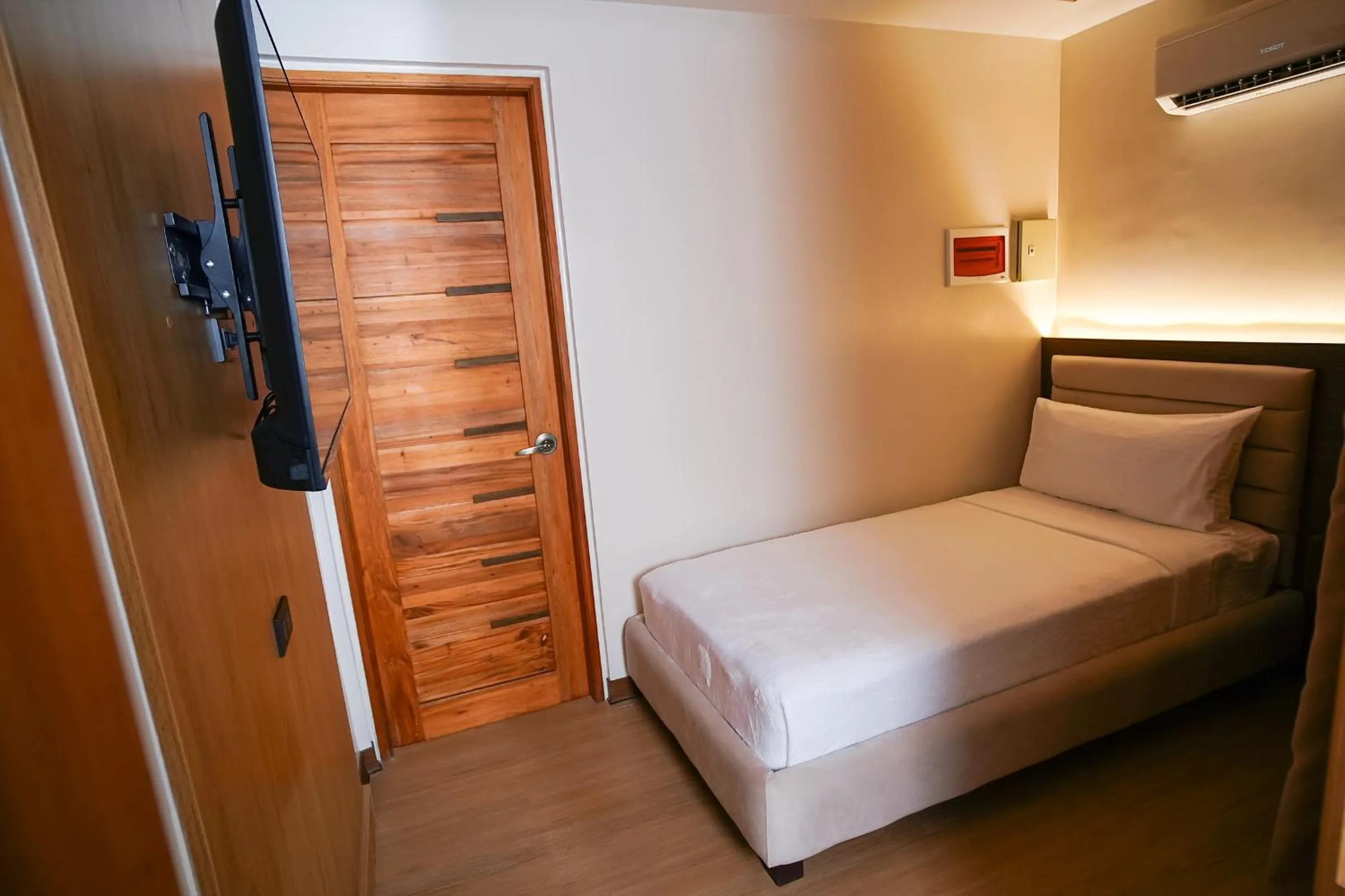 Bed in Gonzales Hotel