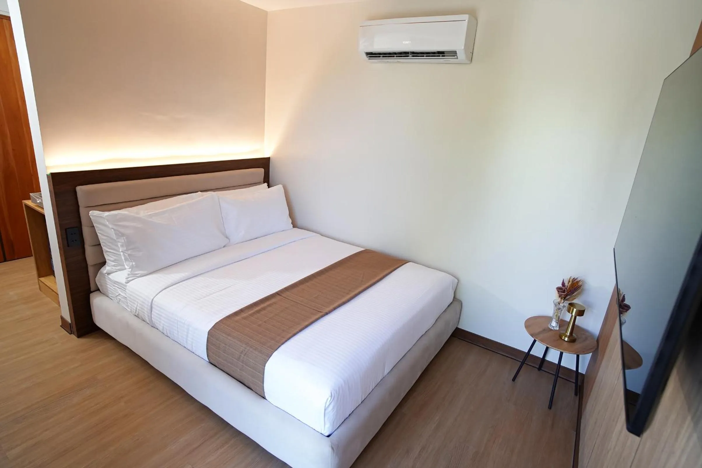 Bed in Gonzales Hotel