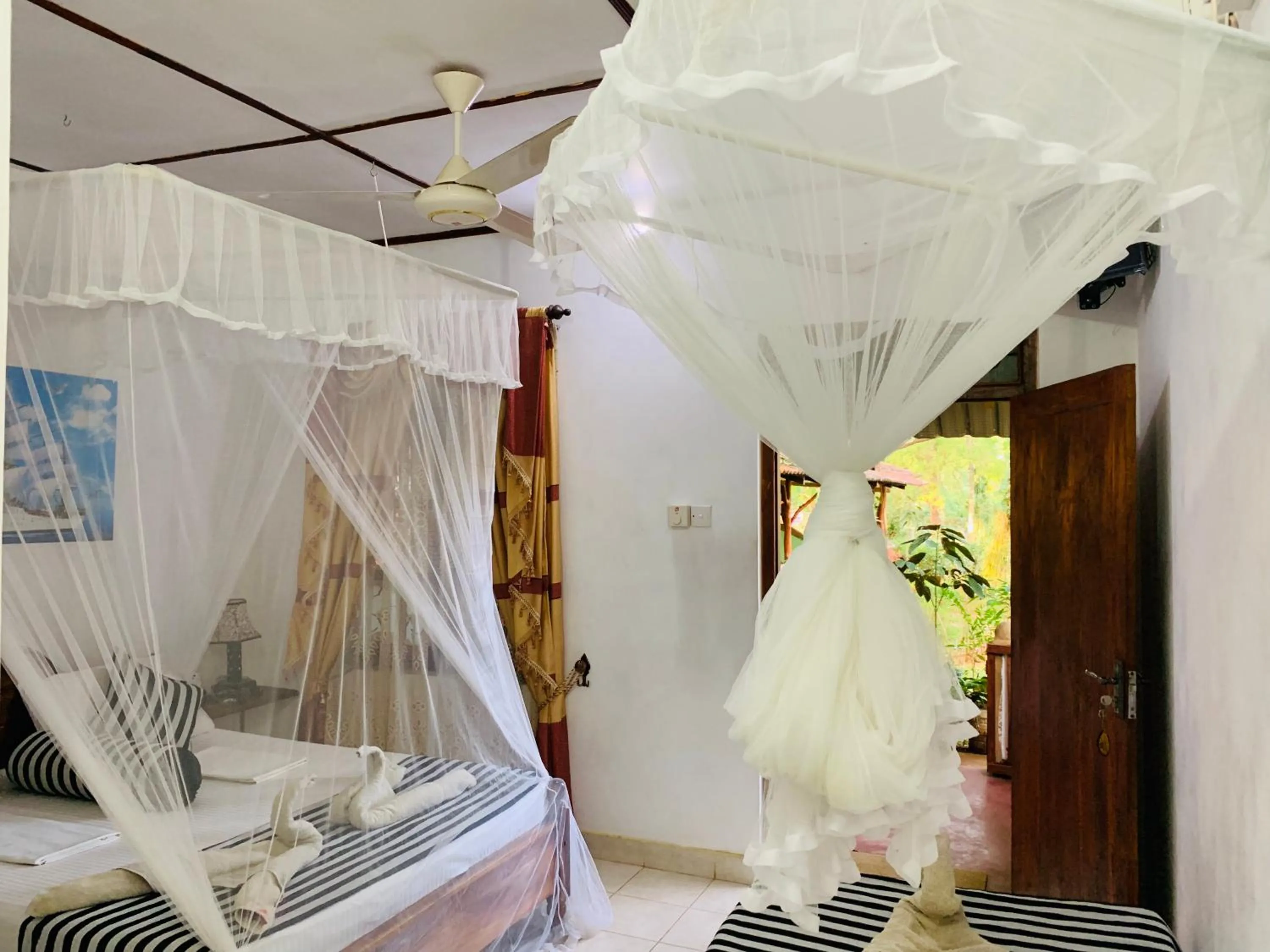 Bed in Sisira Natural Lodge - Sigiriya