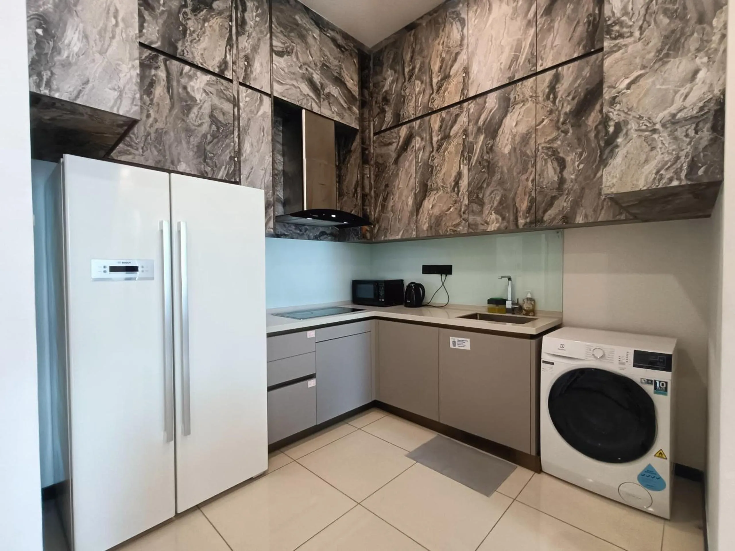 Kitchen or kitchenette in Opus Residences by Centurypro