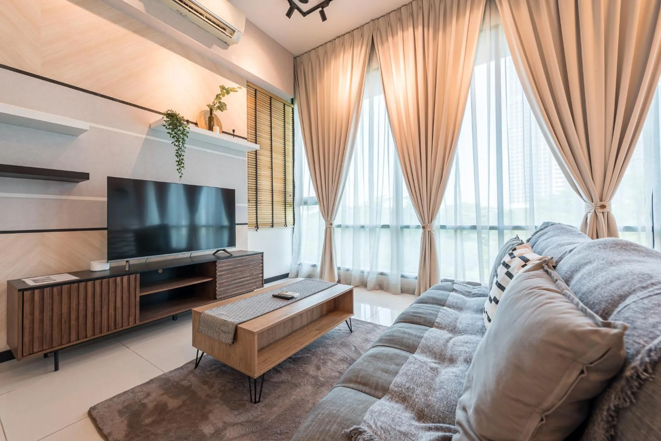 Living room in Opus Residences by Centurypro
