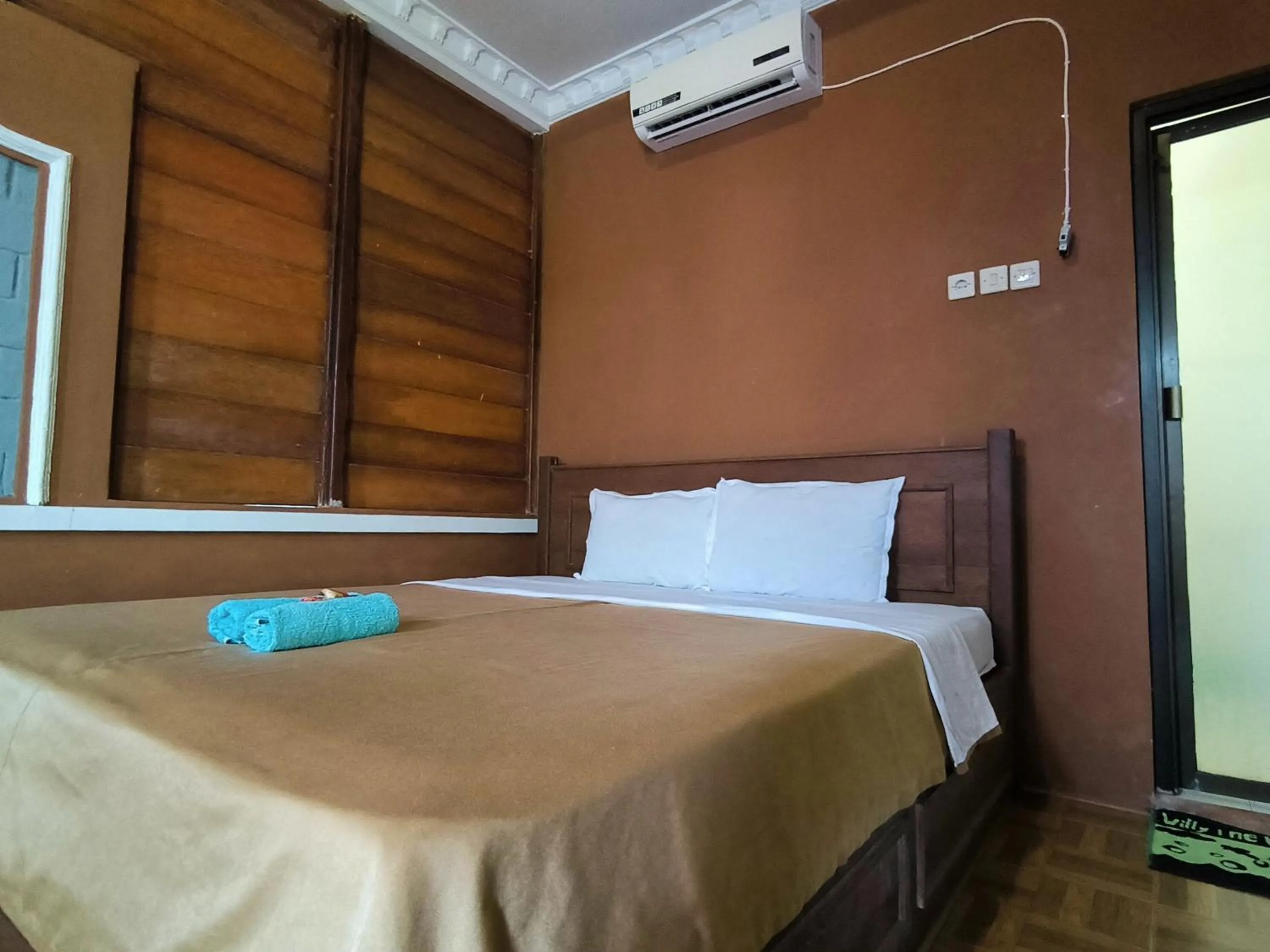 Bed in Sunrise Sea Hill Cottages