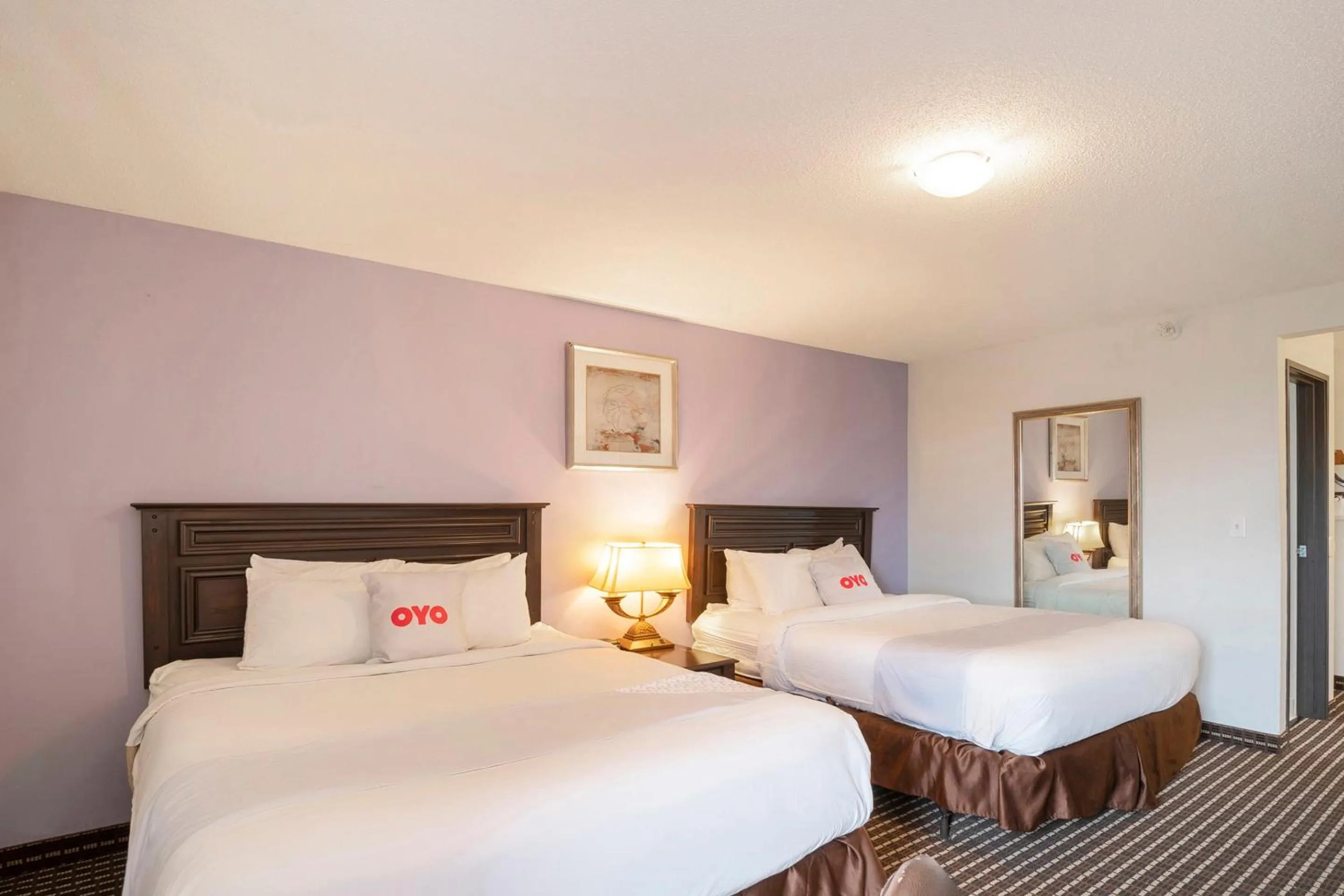 Bedroom, Bed in OYO Townhouse Houston Airport North