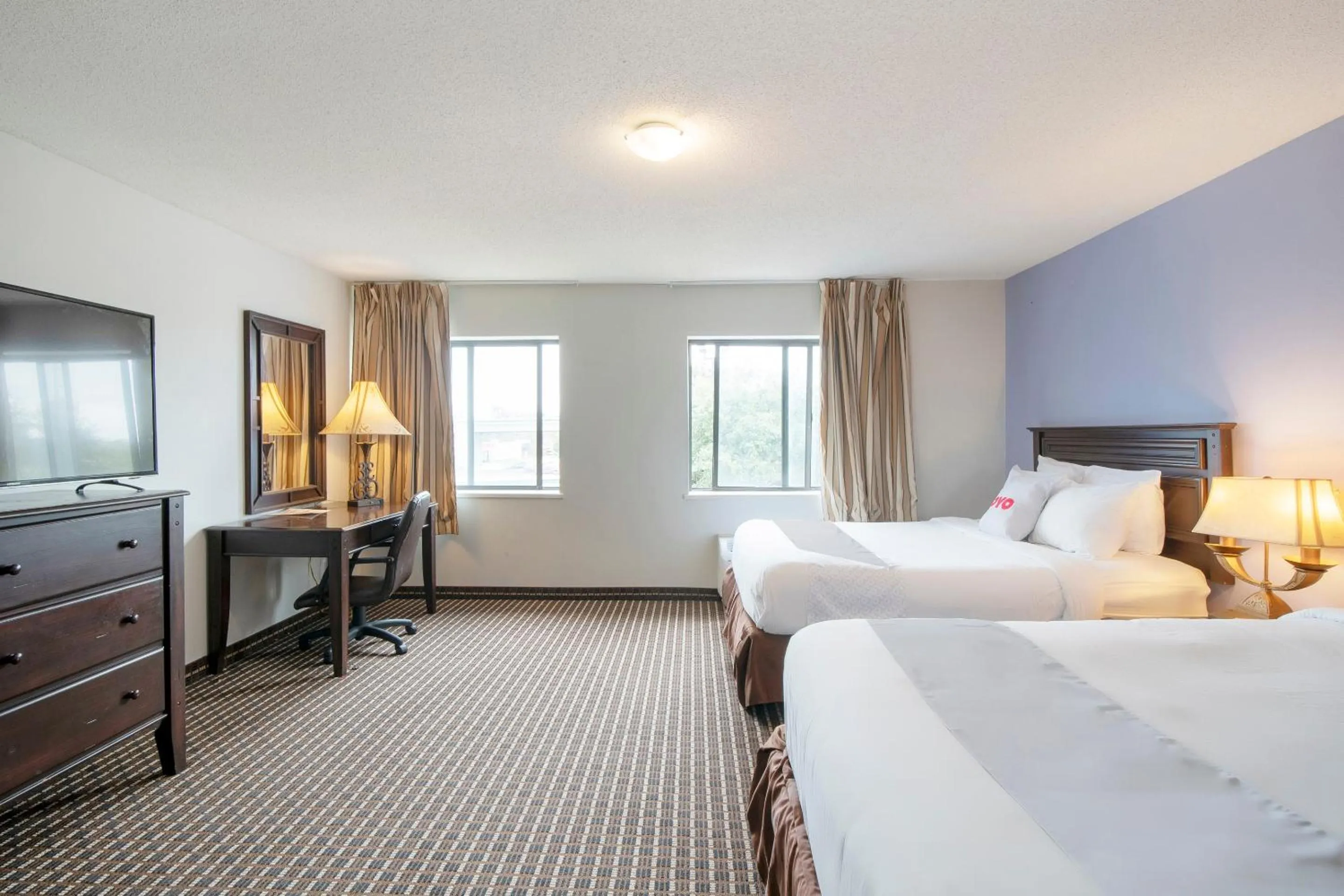 Bedroom, Bed in OYO Townhouse Houston Airport North