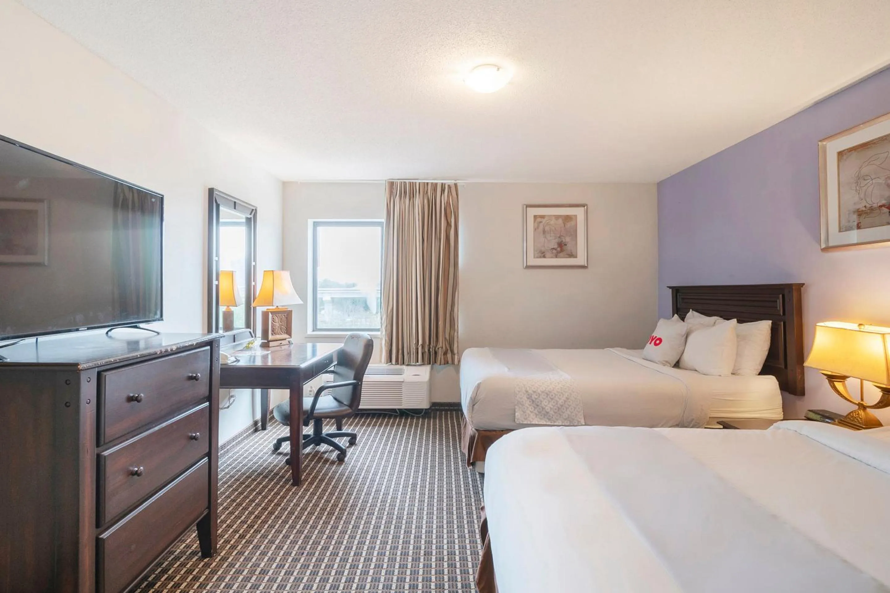 Bedroom, Bed in OYO Townhouse Houston Airport North