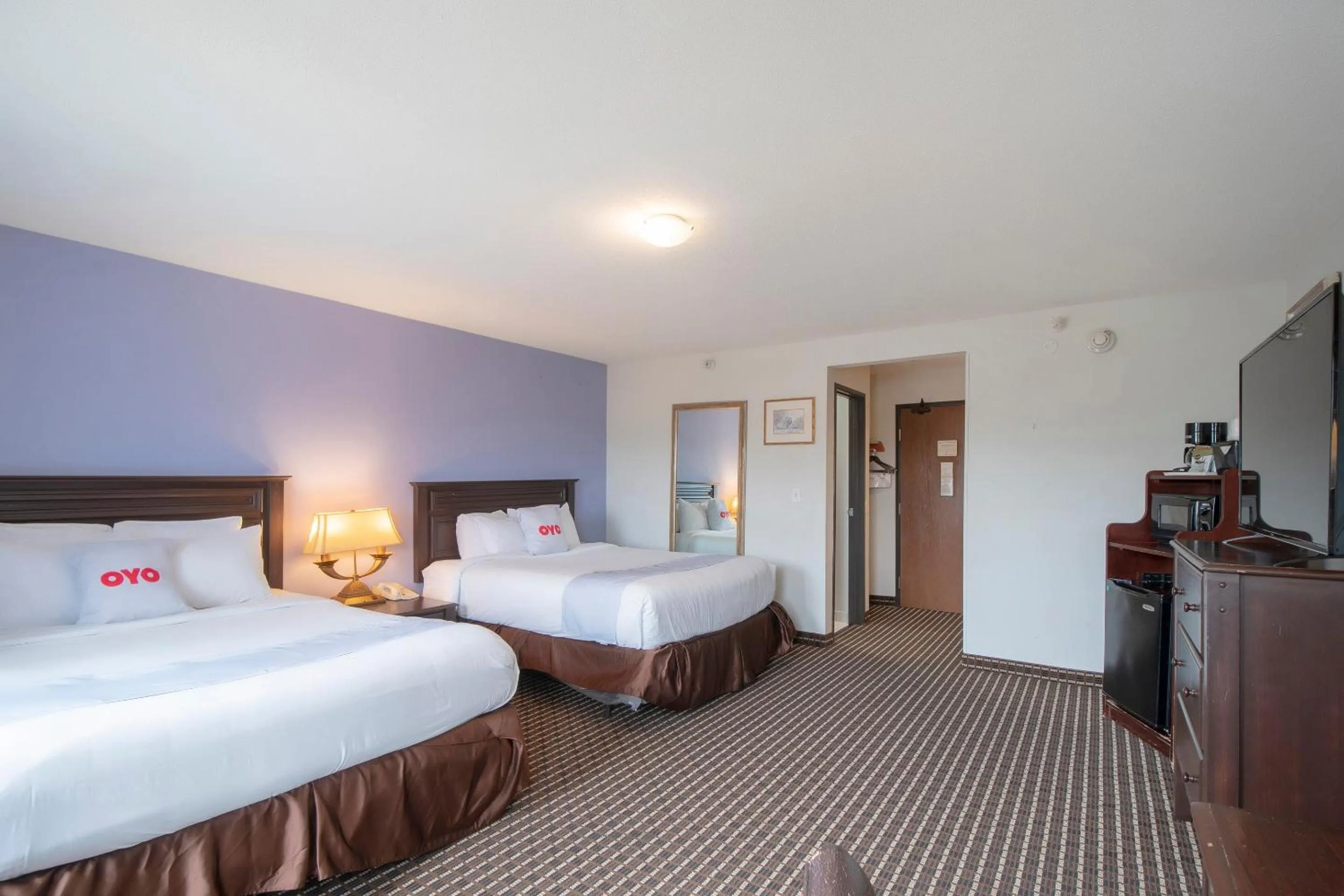 Bedroom, Bed in OYO Townhouse Houston Airport North