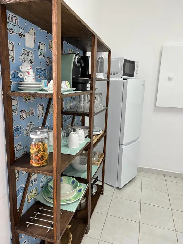 Kitchen or kitchenette in Alvalade II Airport Guest House