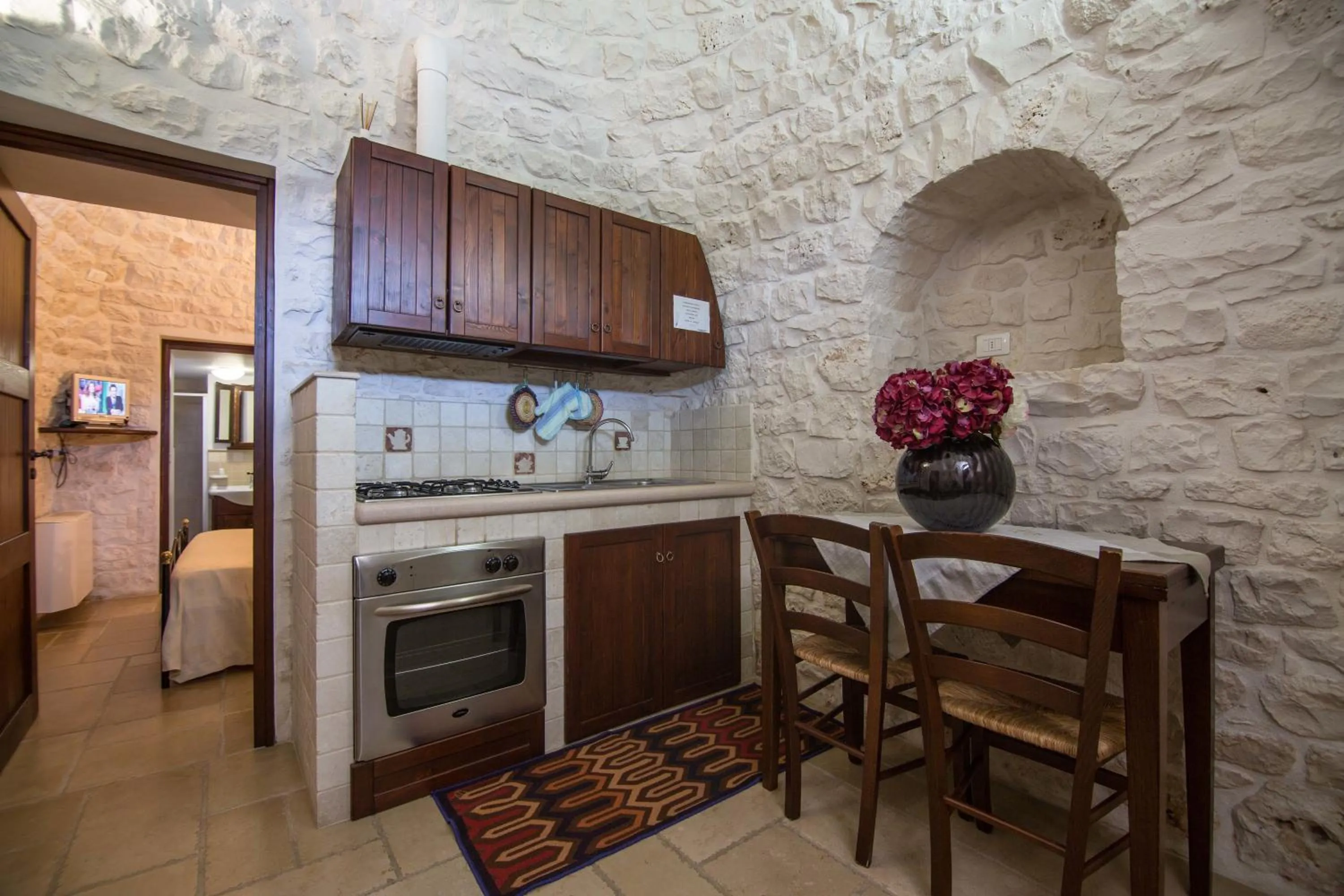 Kitchen or kitchenette in Bed and Breakfast Trulli San Leonardo
