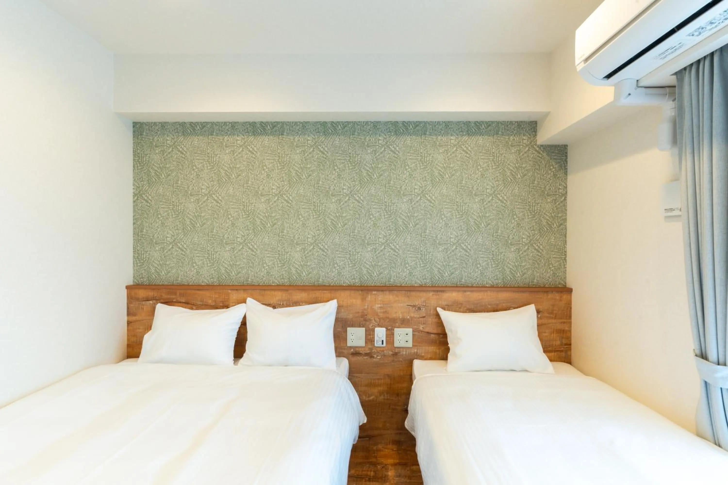 Bedroom, Bed in Hotel Living Inn Kenchoumaeeki