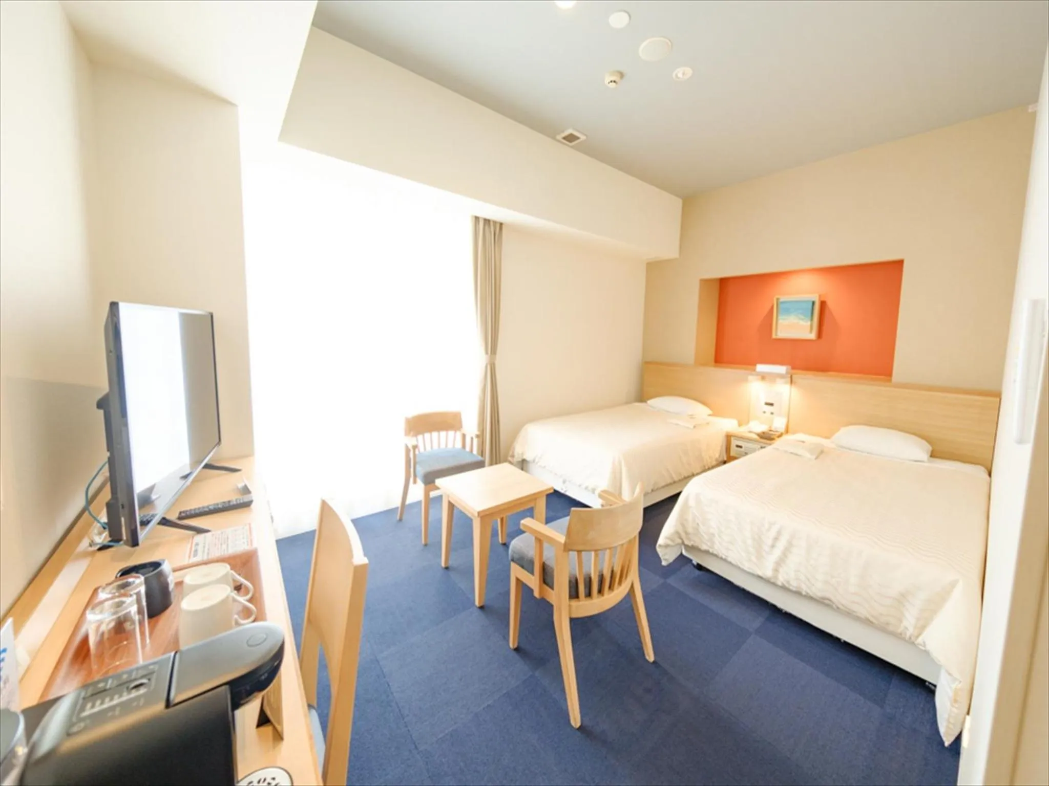 Photo of the whole room, Bed in Hotel Risingsun Miyakojima