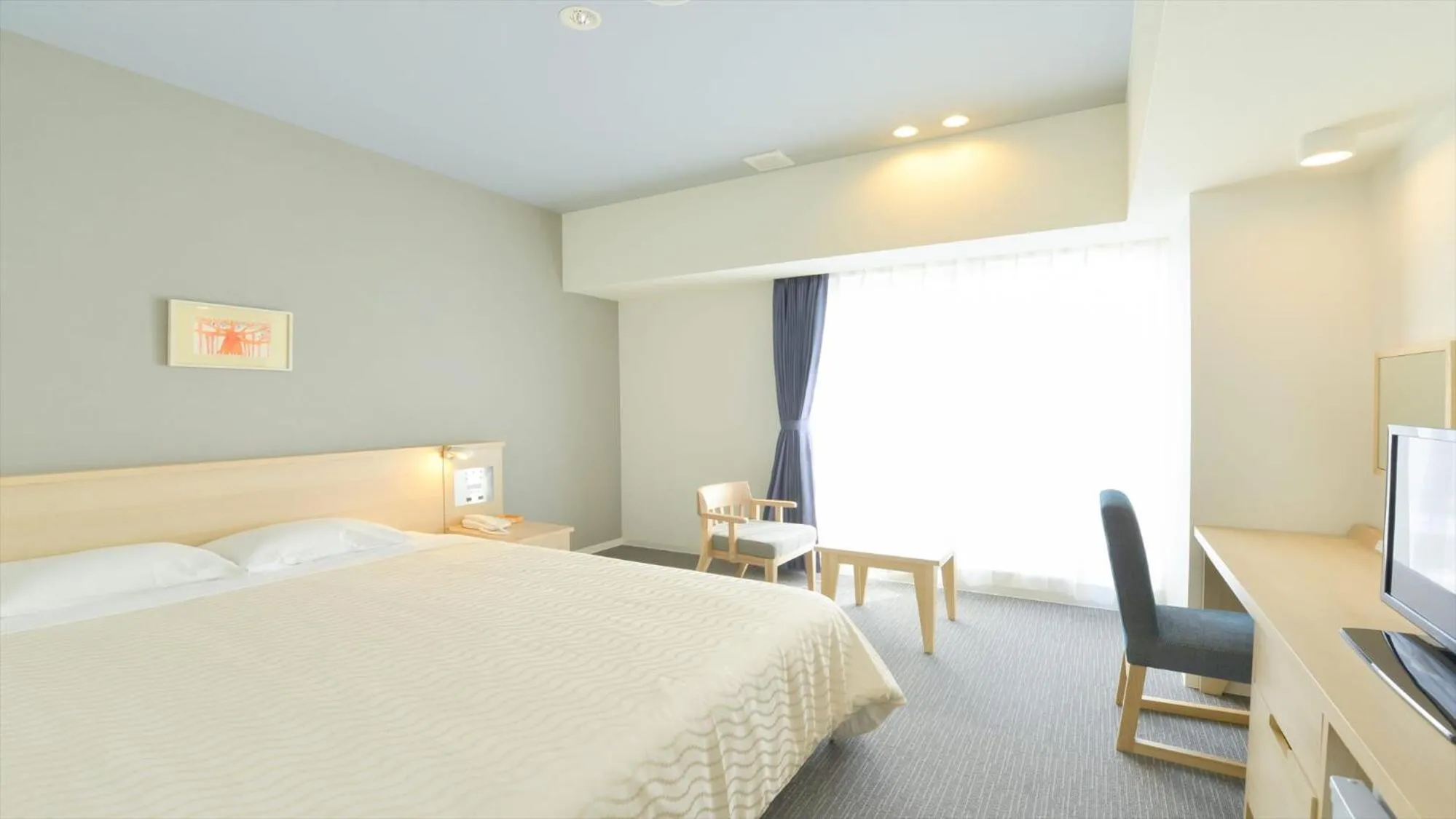 Photo of the whole room, Bed in Hotel Risingsun Miyakojima