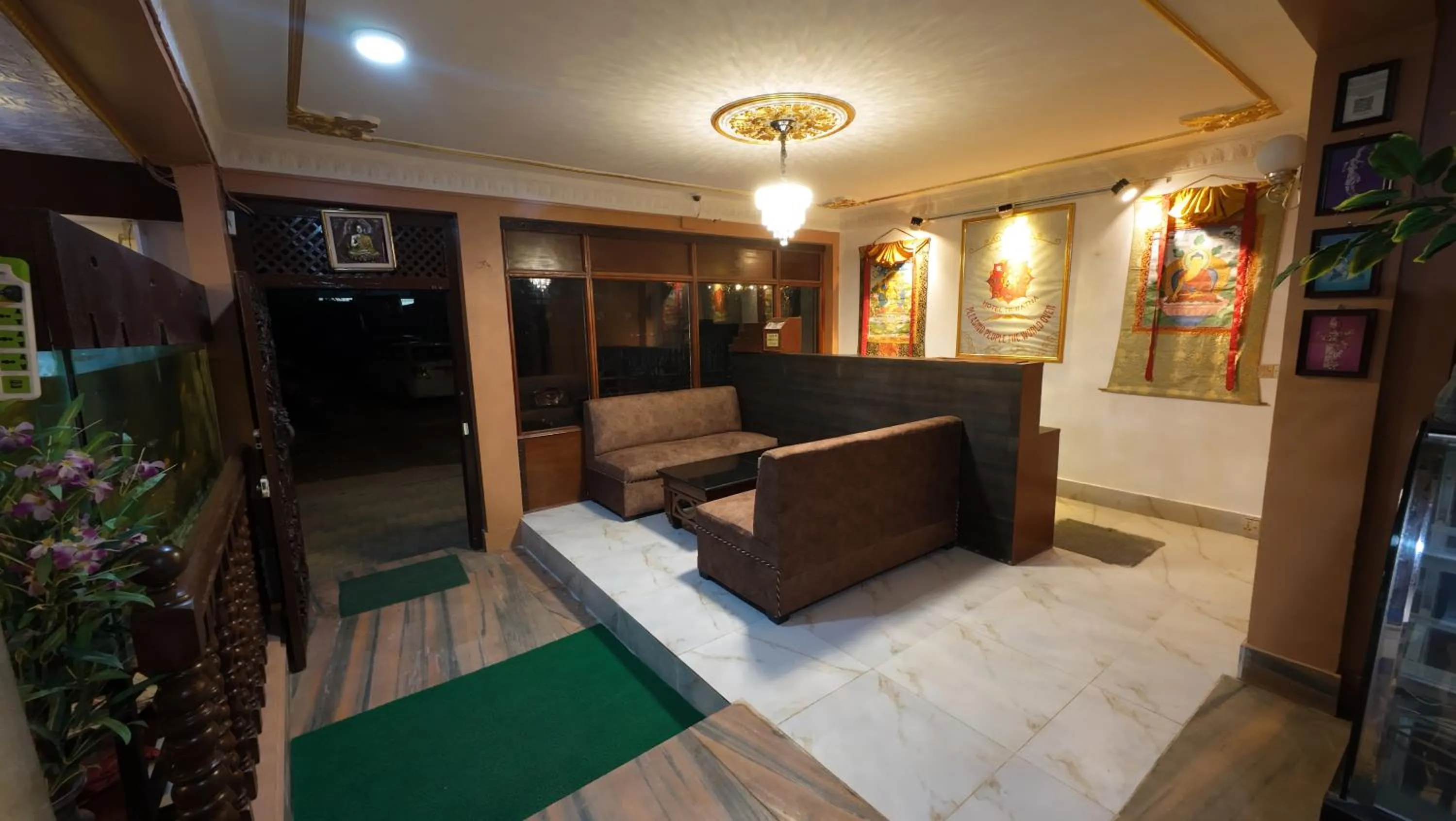 Communal lounge/ TV room in Hotel Triratna