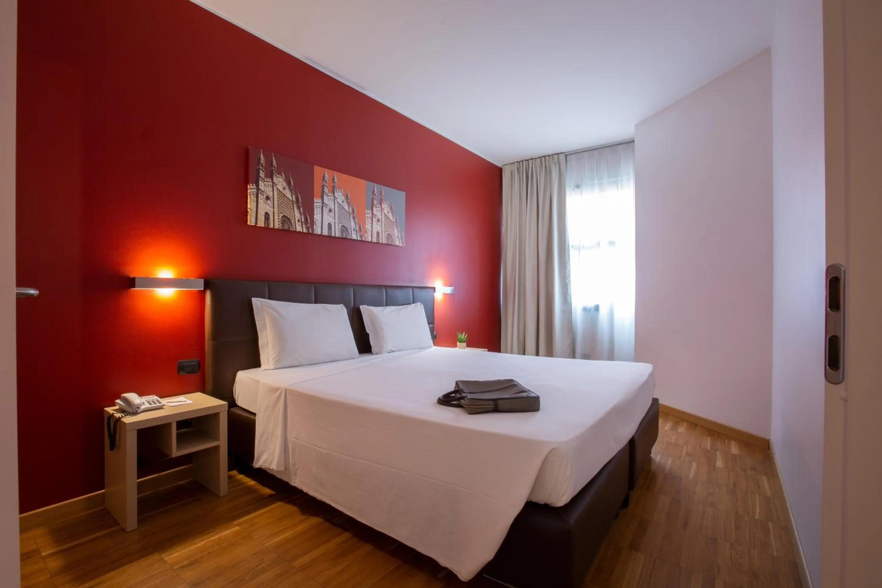 Bed in Euro Hotel Residence