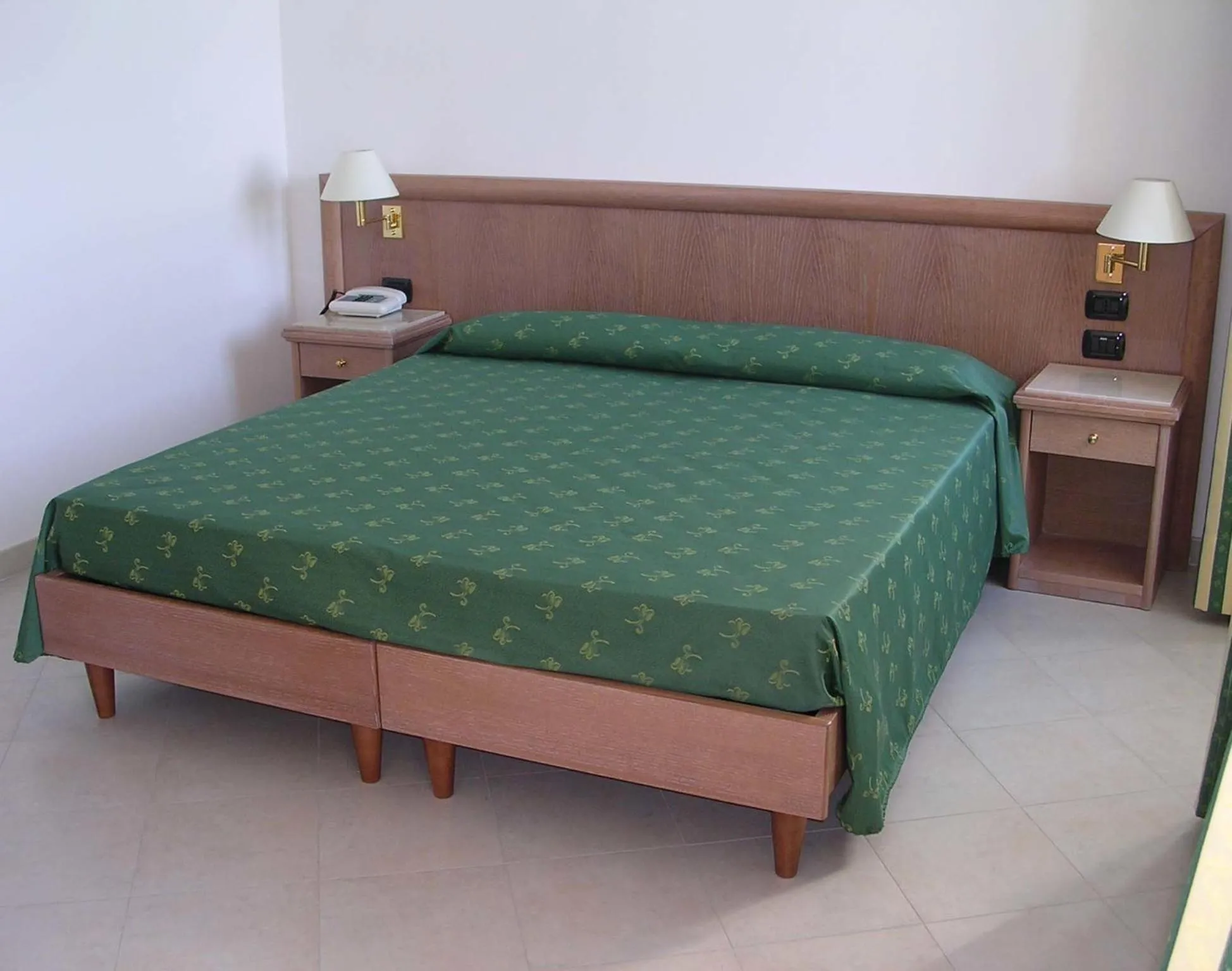 Bed in Hotel Riviera