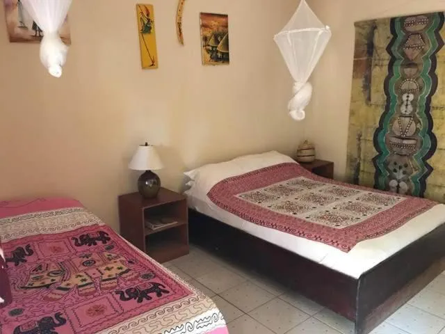Bed in The Gunjur Project Lodge