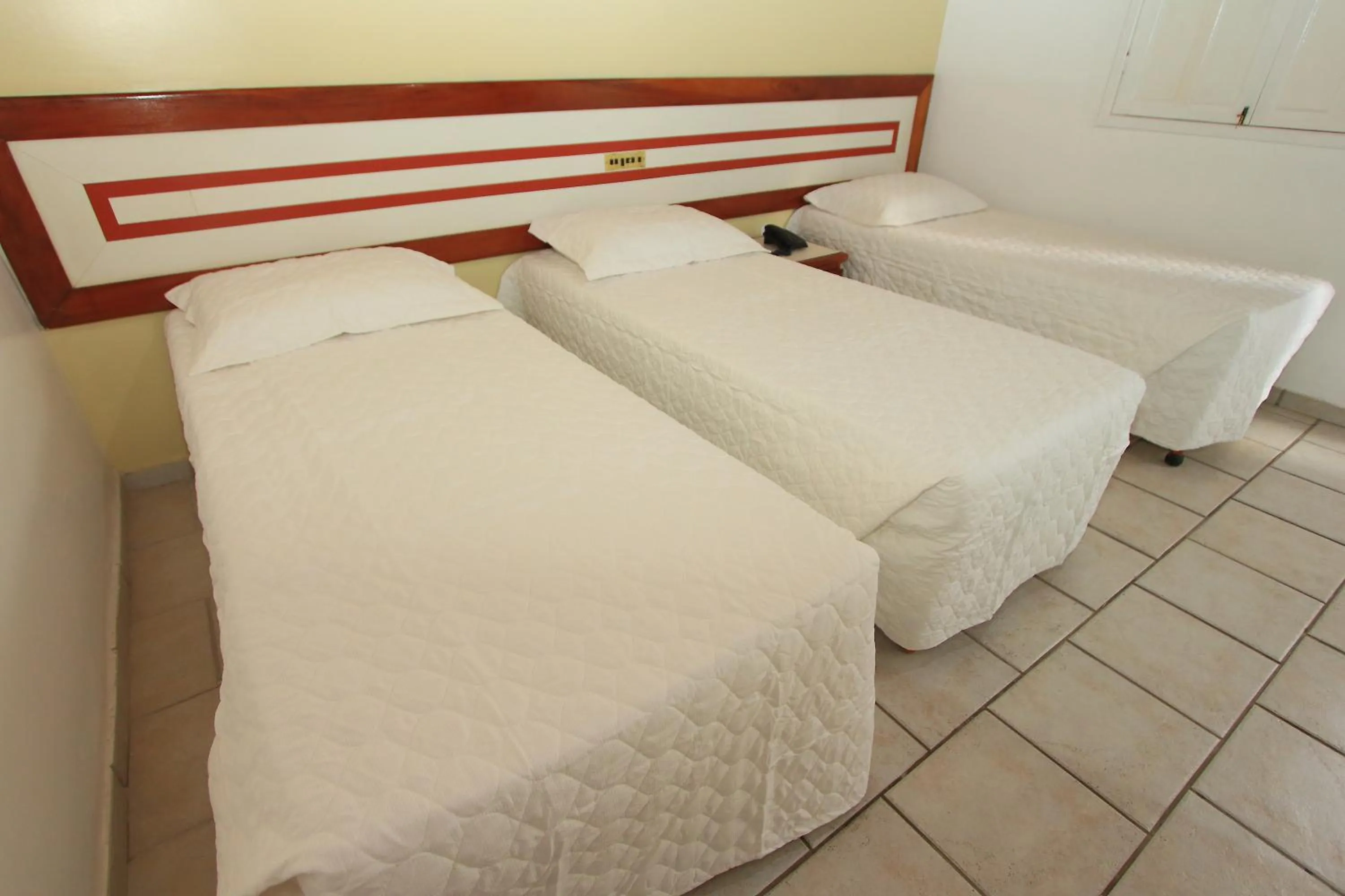 Bed in Navegantes Hotel