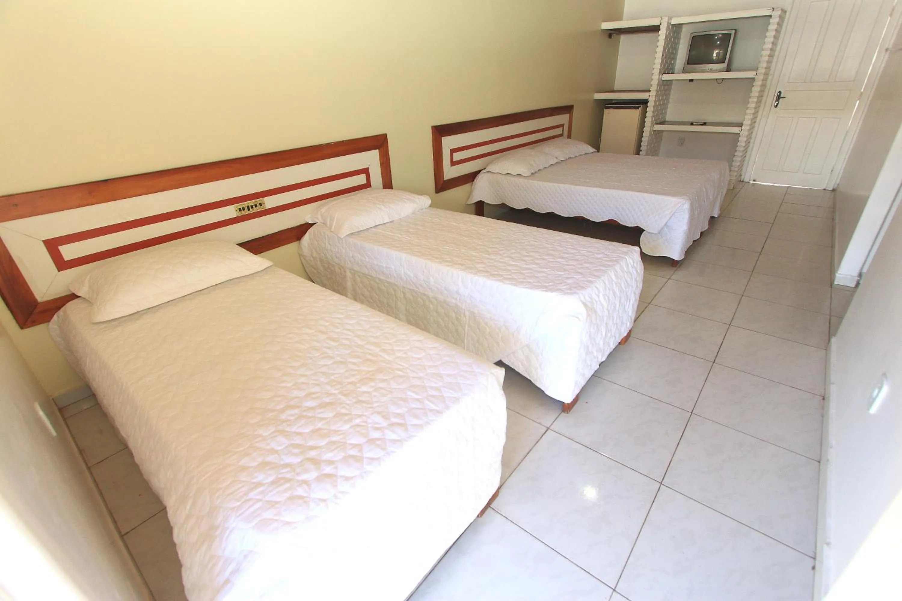 Bed in Navegantes Hotel