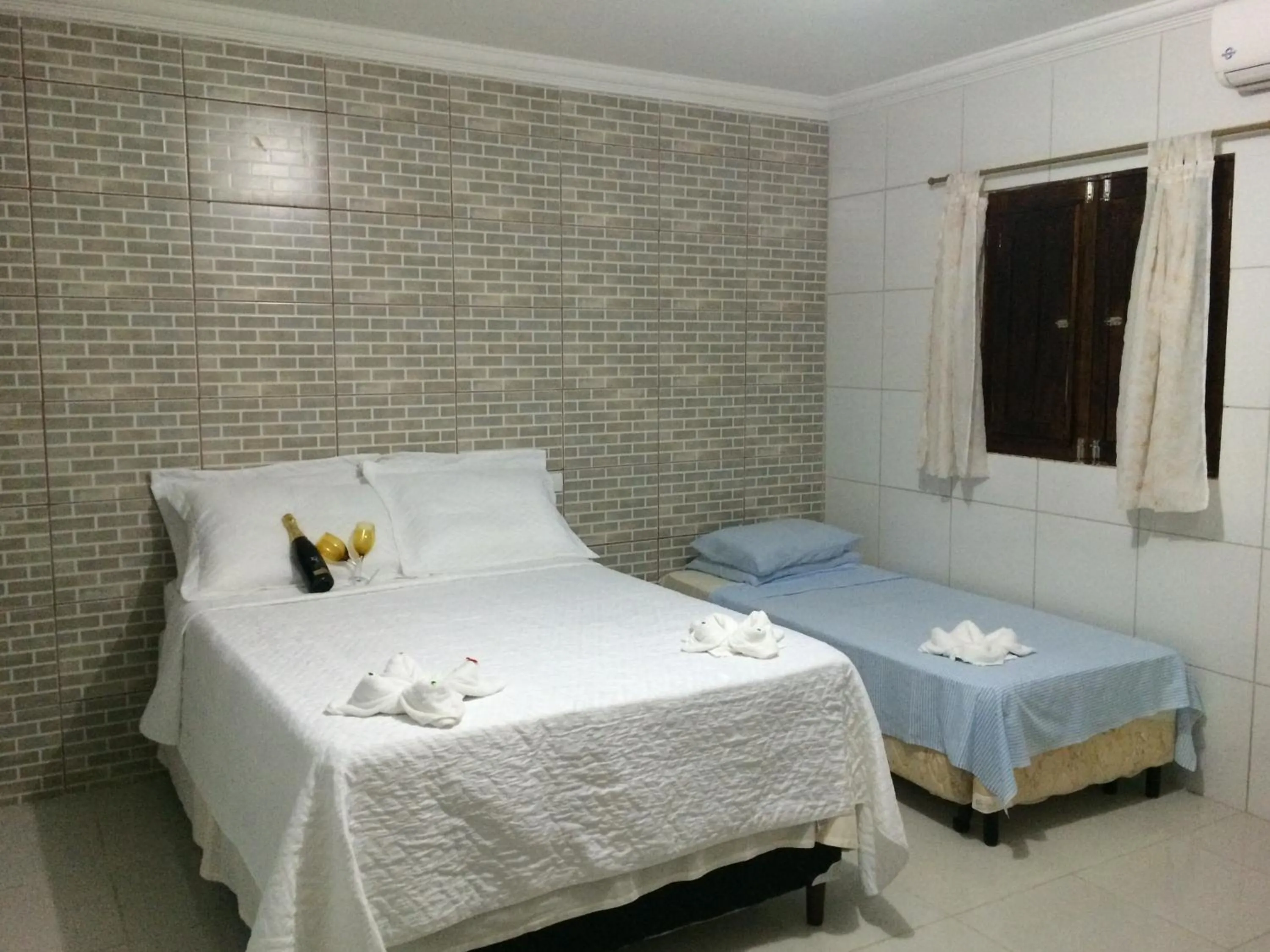 Bed in Chalés de Peroba