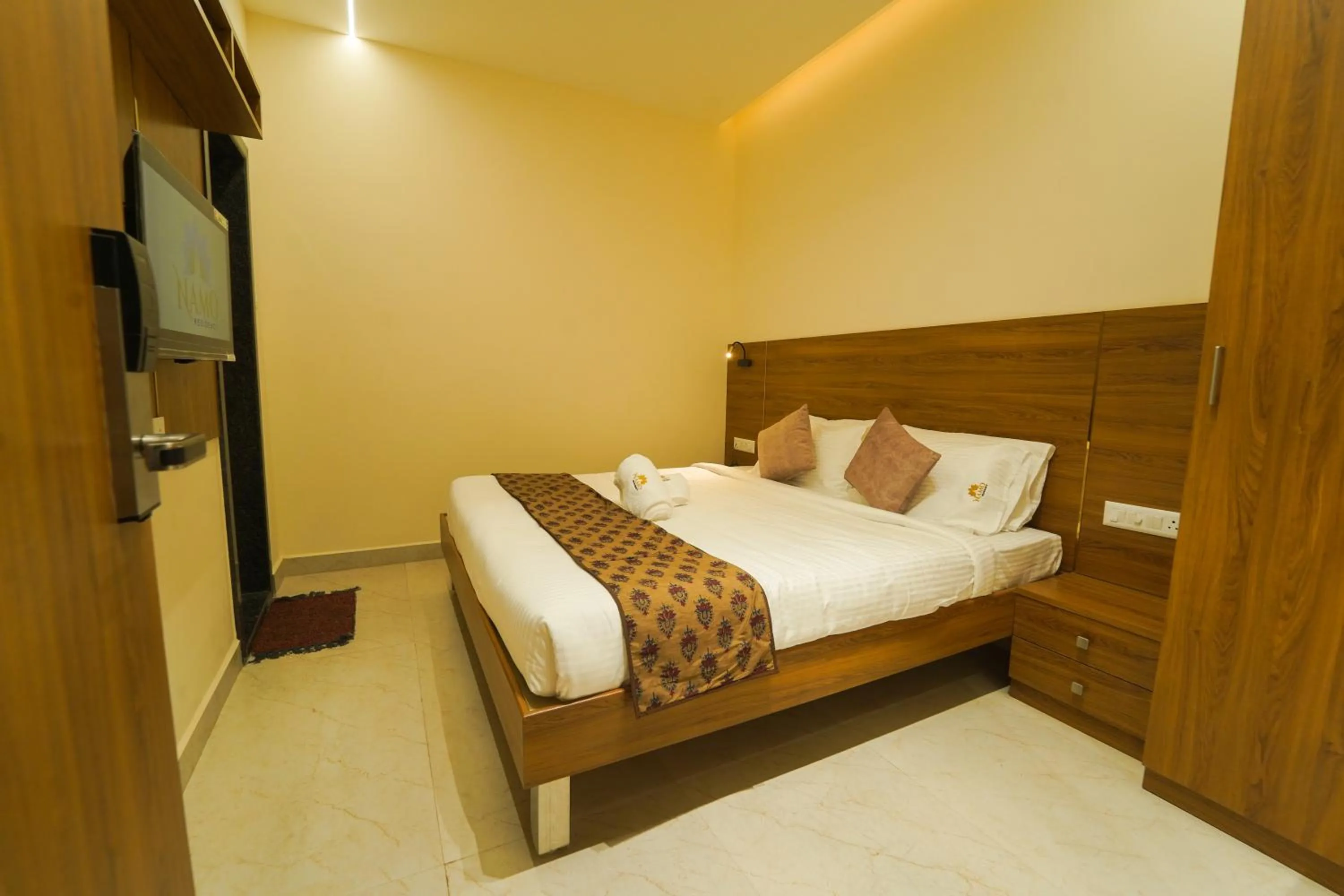 Bed in Namo Residency