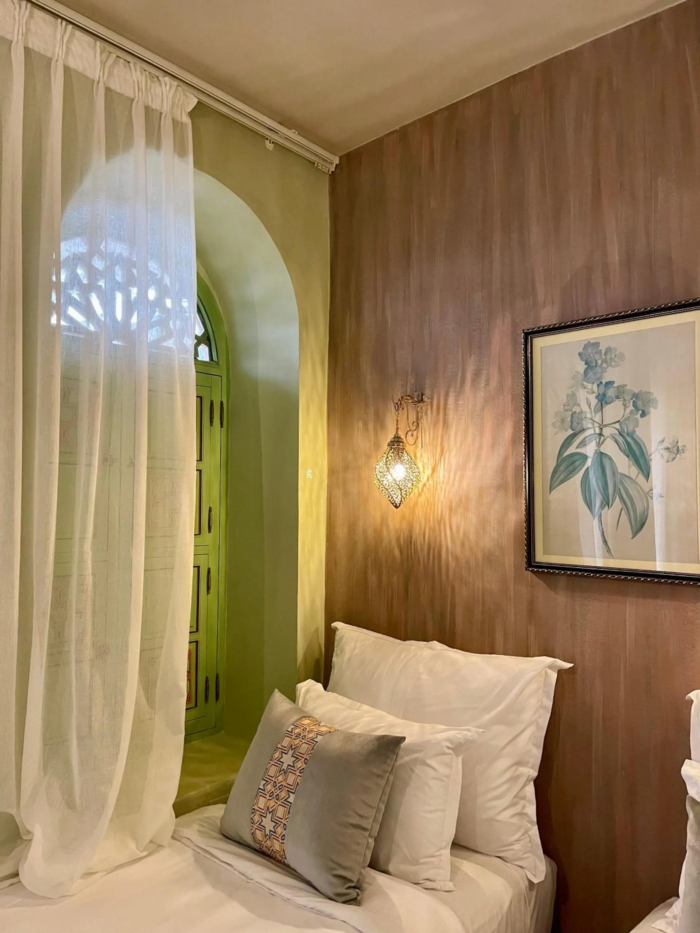 Bed in Riad La Calèche