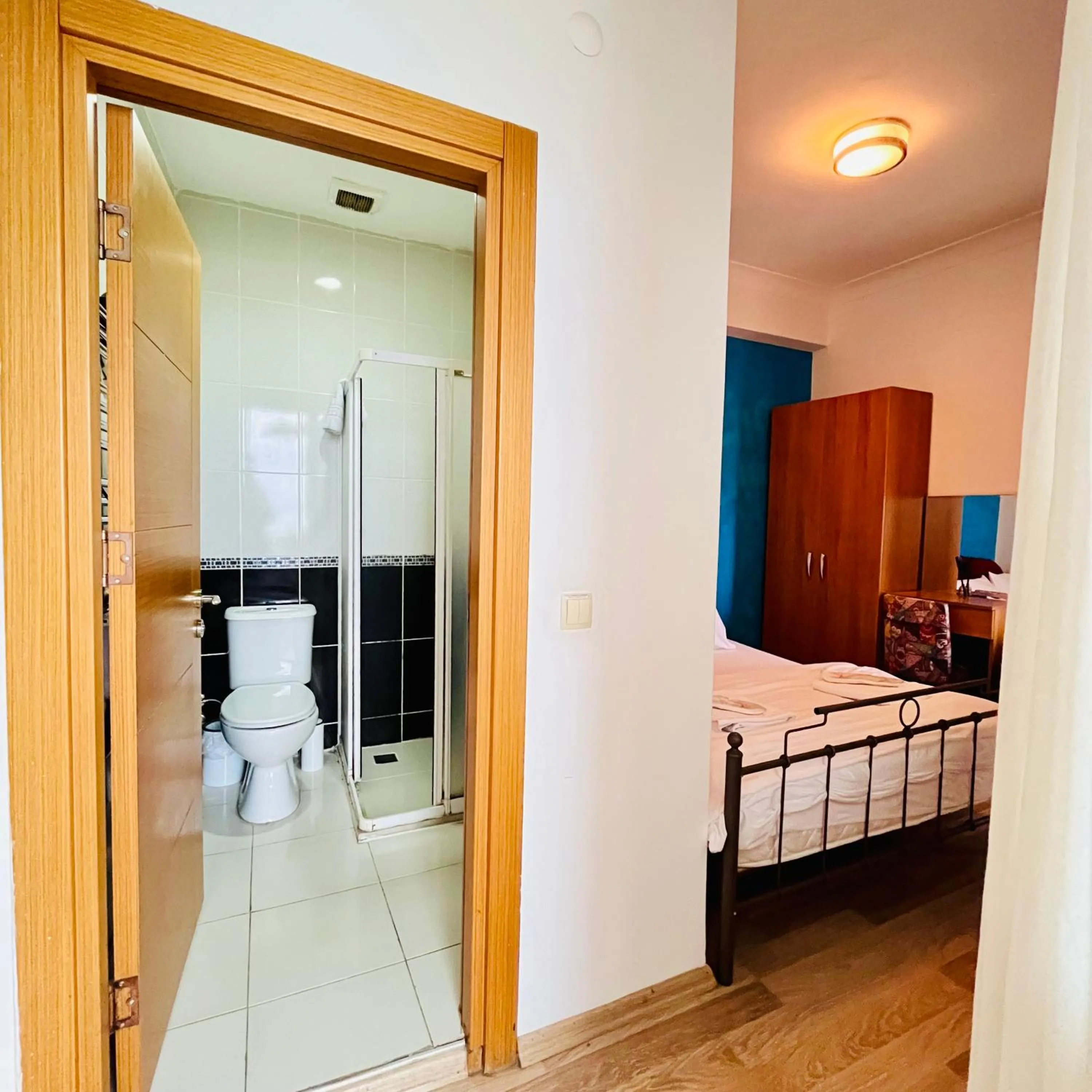 Photo of the whole room, Bed in By Sukru Hotel