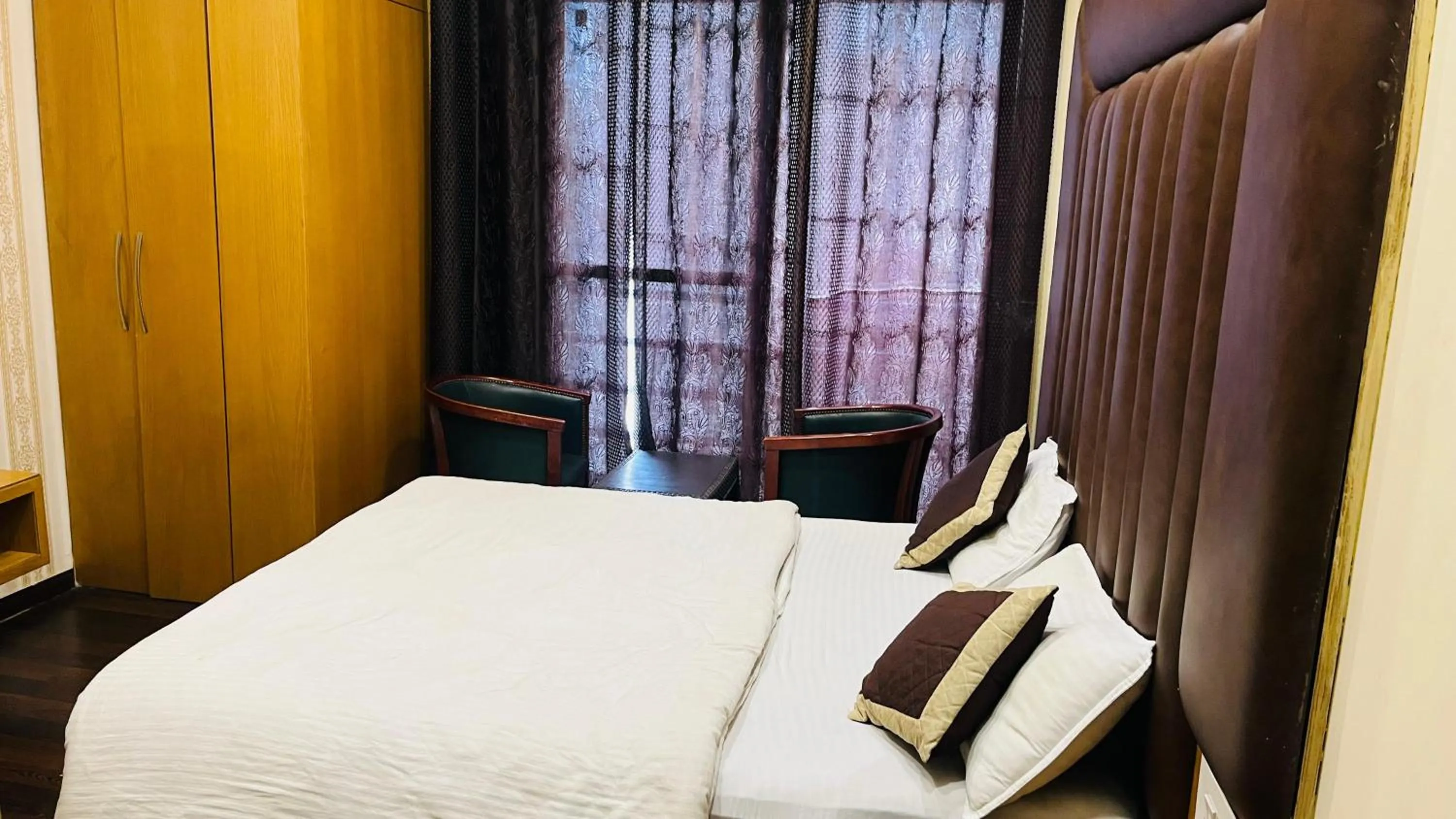 Bed in Hotel New Holiday