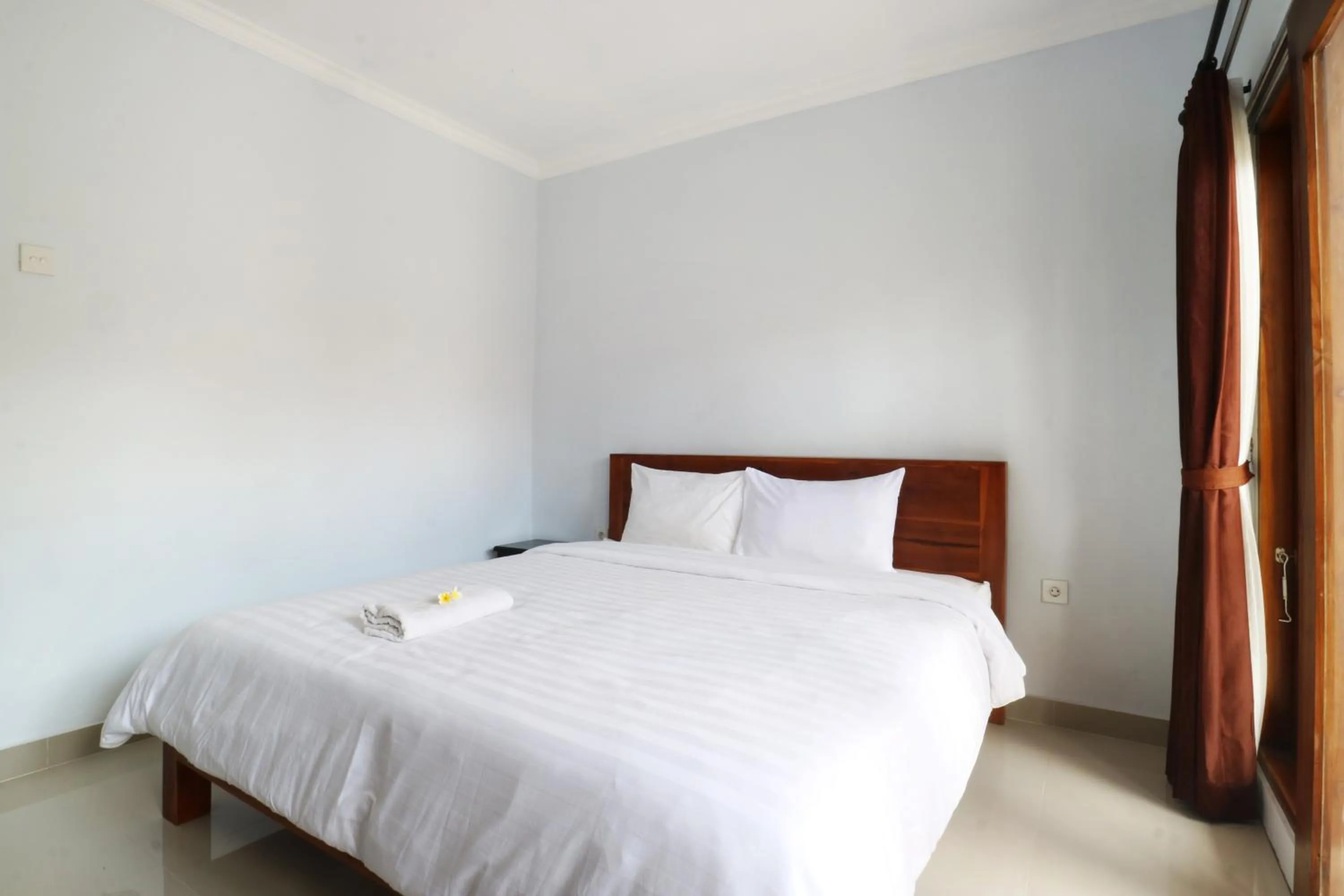 Bedroom, Bed in The Wina Echo Beach Guest House