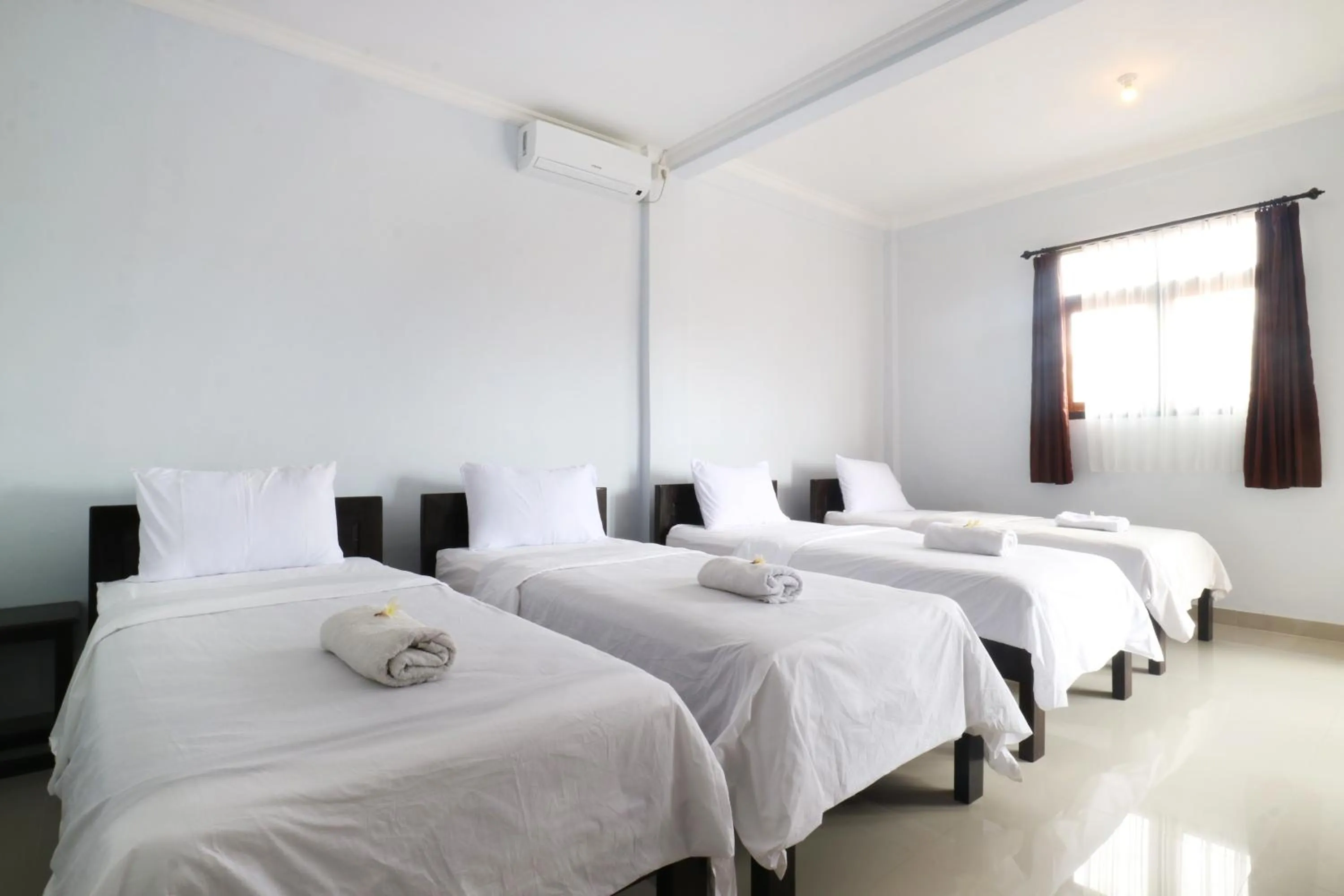 Bedroom, Bed in The Wina Echo Beach Guest House