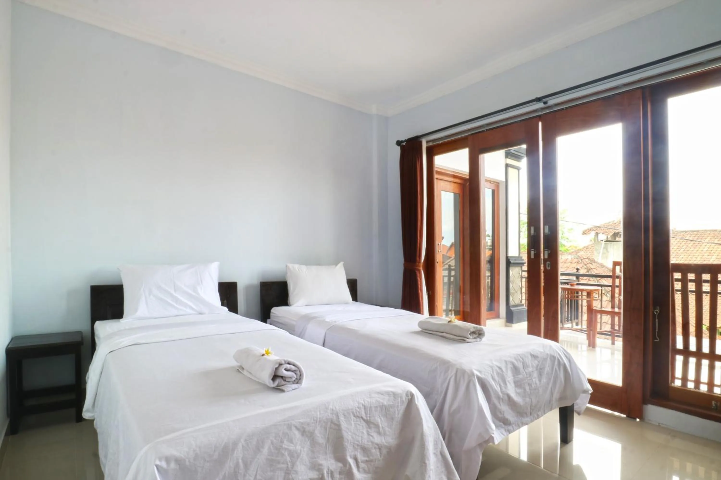 Bedroom, Bed in The Wina Echo Beach Guest House