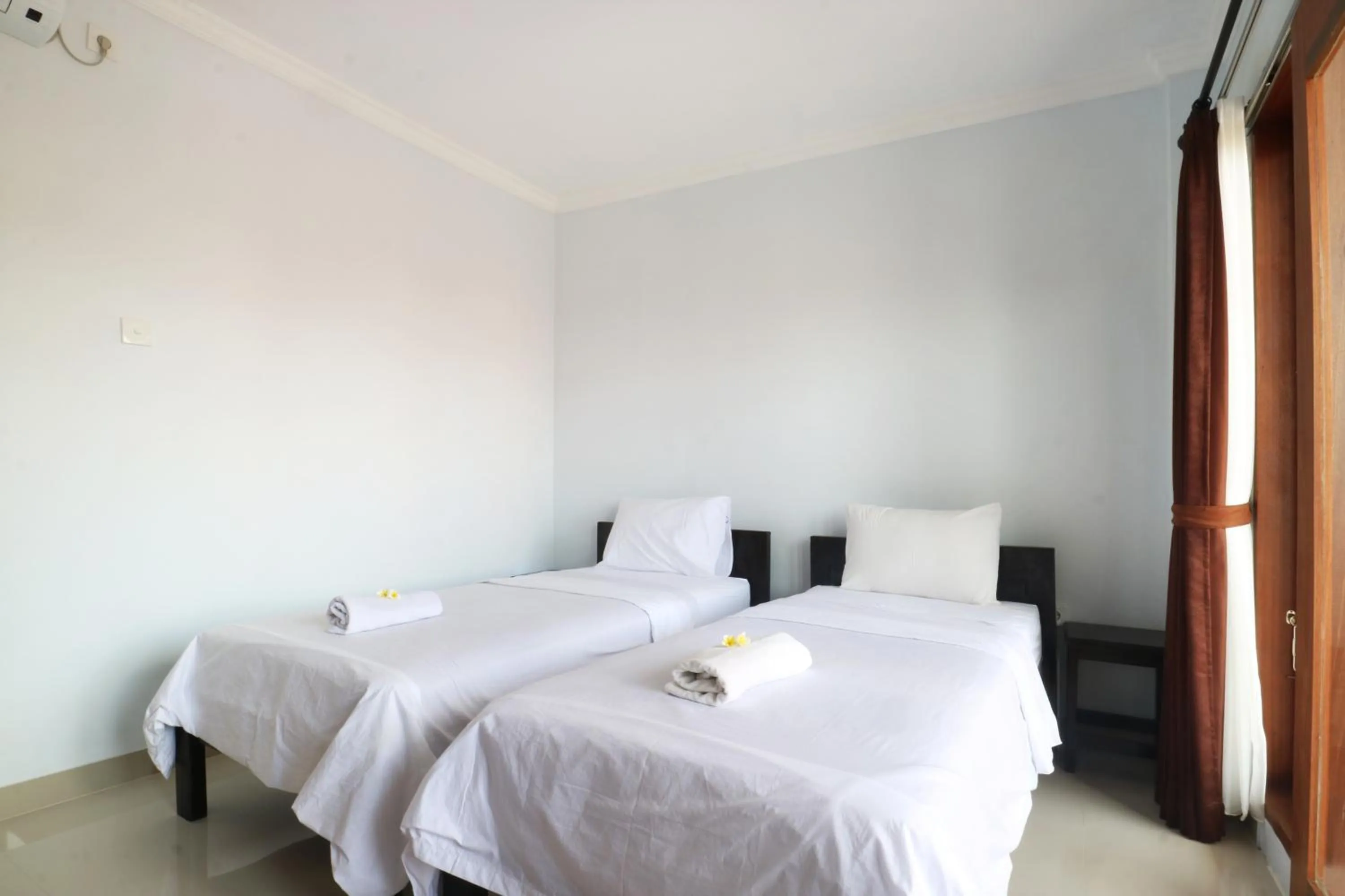 Bedroom, Bed in The Wina Echo Beach Guest House