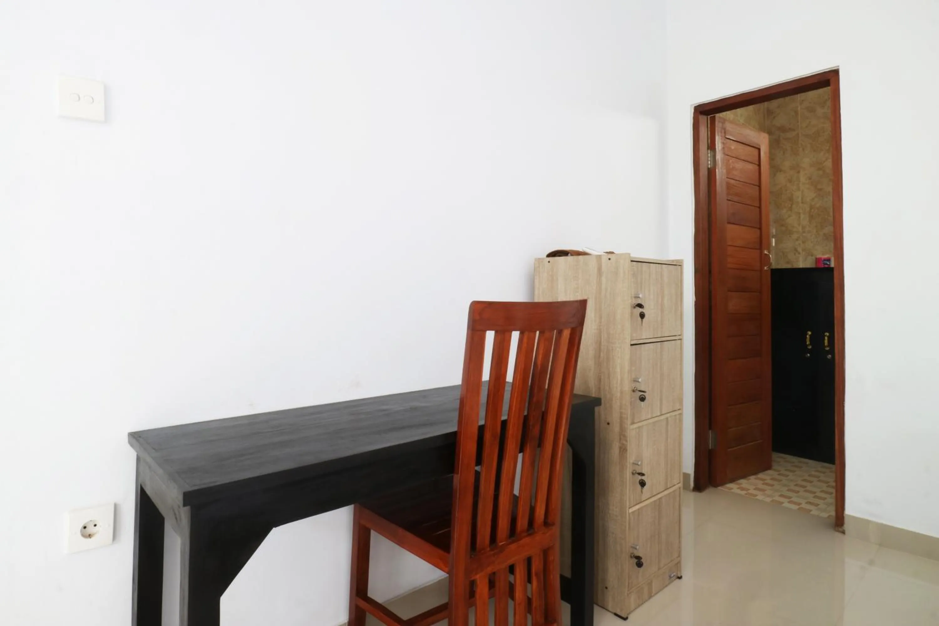 Bedroom in The Wina Echo Beach Guest House