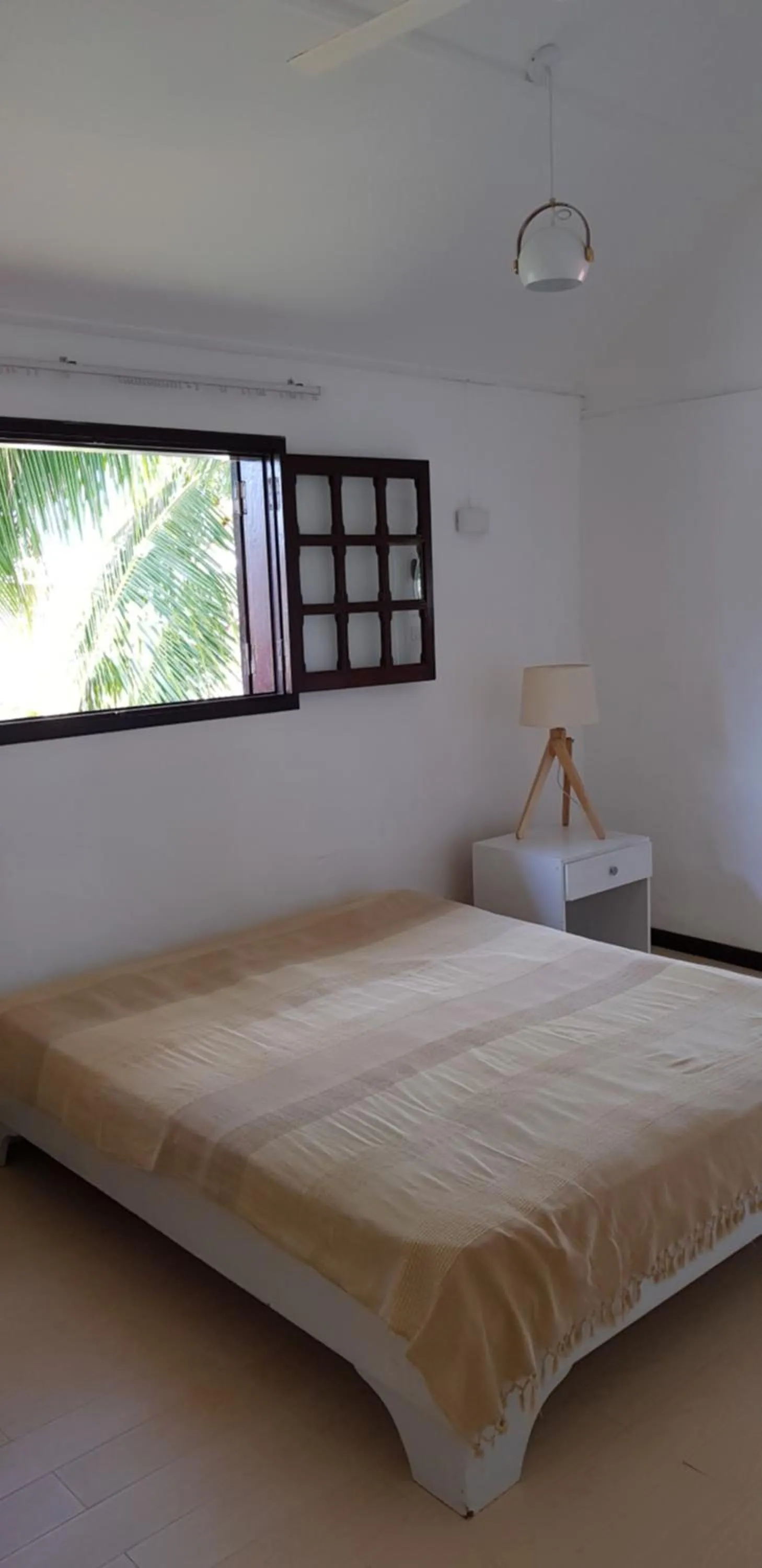 Bed in Colibri Beach Villas